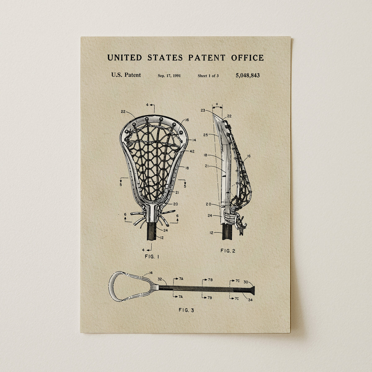 The image is a patent drawing of a lacrosse stick, depicting the design and structure of the lacrosse stick in a technical drawing format.