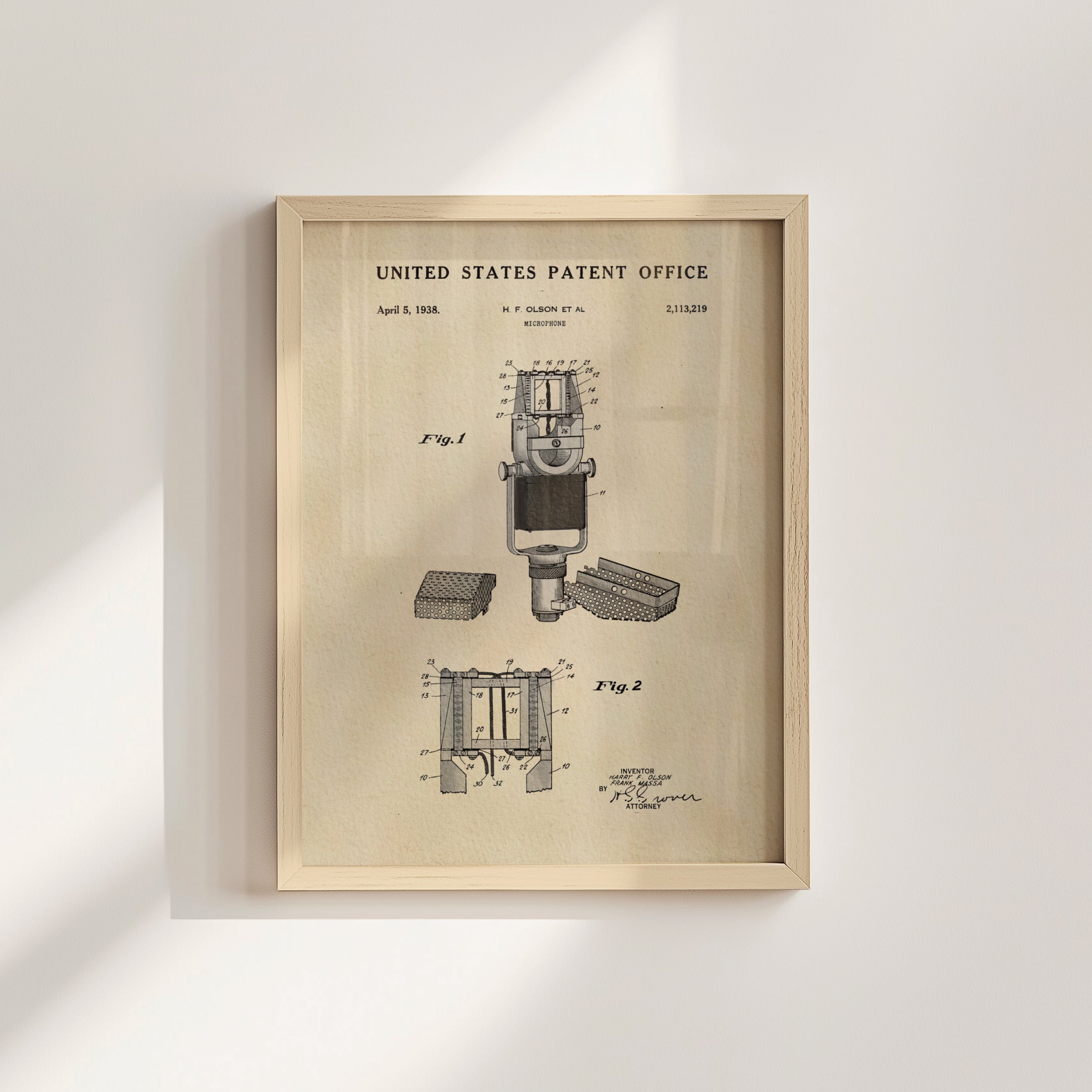 The image is a framed vintage patent drawing from the United States Patent Office, depicting a microphone and its components.