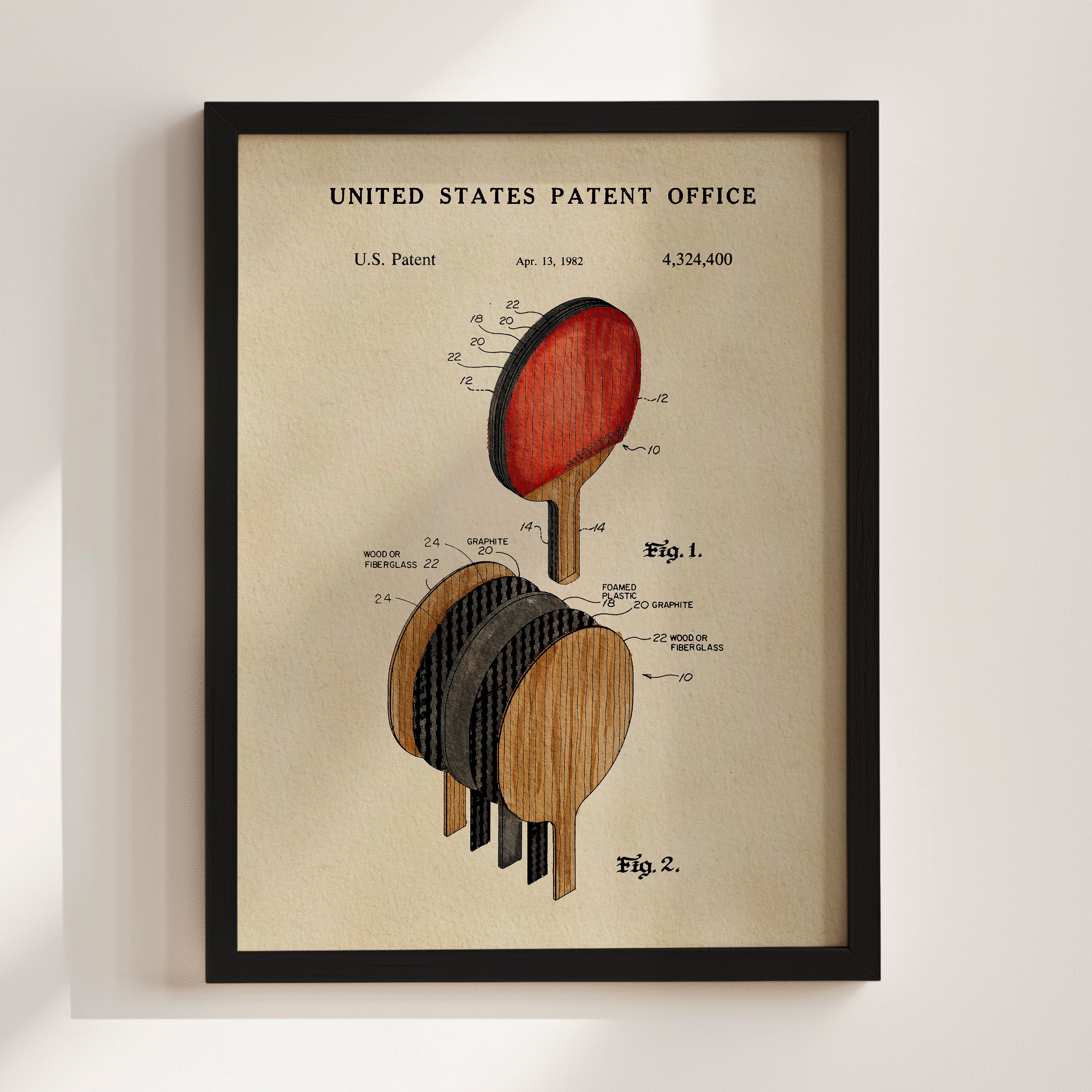 The image is a framed patent drawing depicting a paddle, which is a common object used in table tennis.