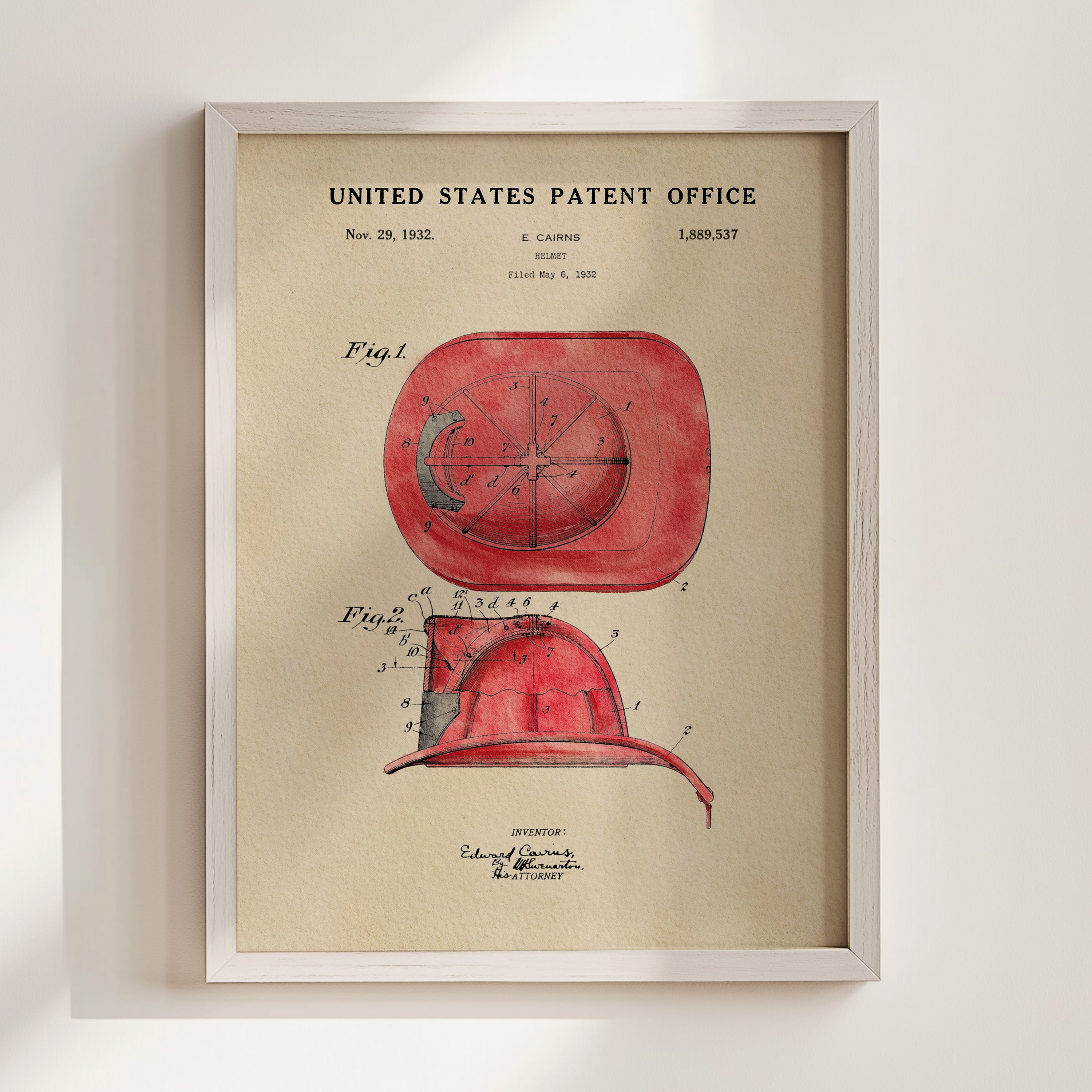 The image is a framed patent drawing of a red fire helmet, depicting the design and features of the helmet.