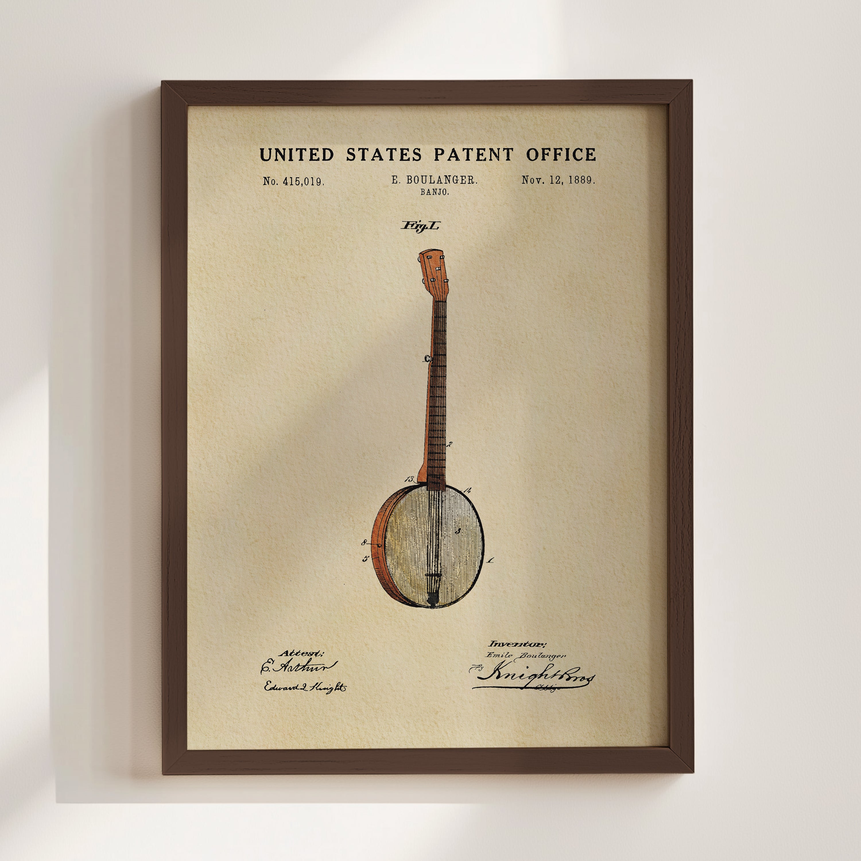 The image is a framed print of a banjo patent from the United States Patent Office, dated November 12, 1899.