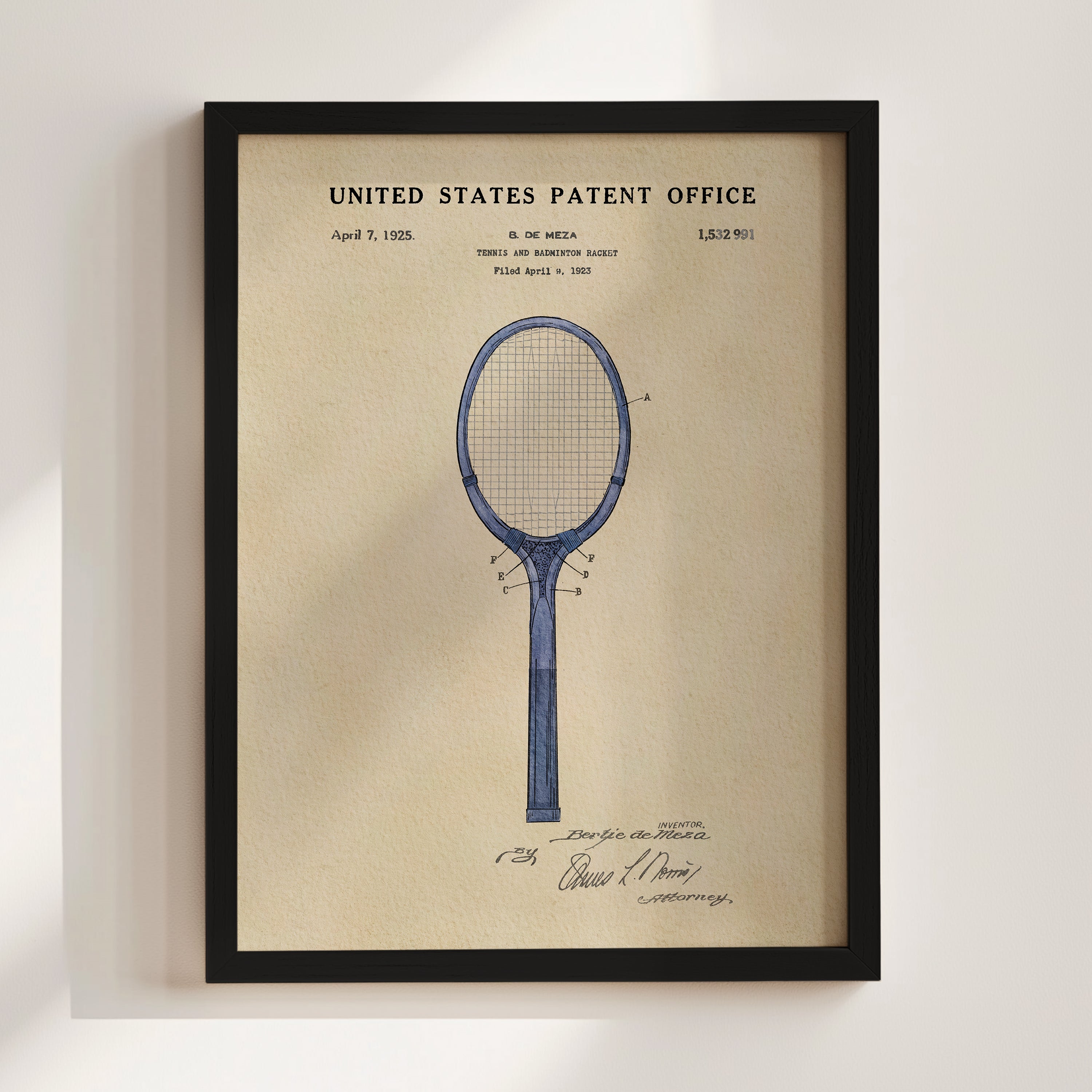 The image is a framed patent drawing of a tennis racket, depicting the design and features of the racket.