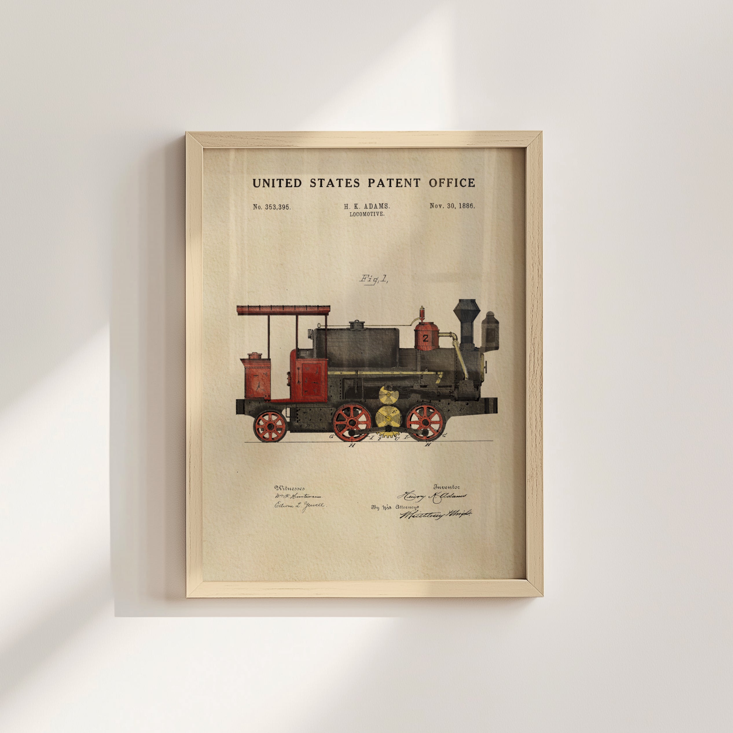 The image is a framed print of a United States patent office patent from November 30, 1885, depicting a steam locomotive.