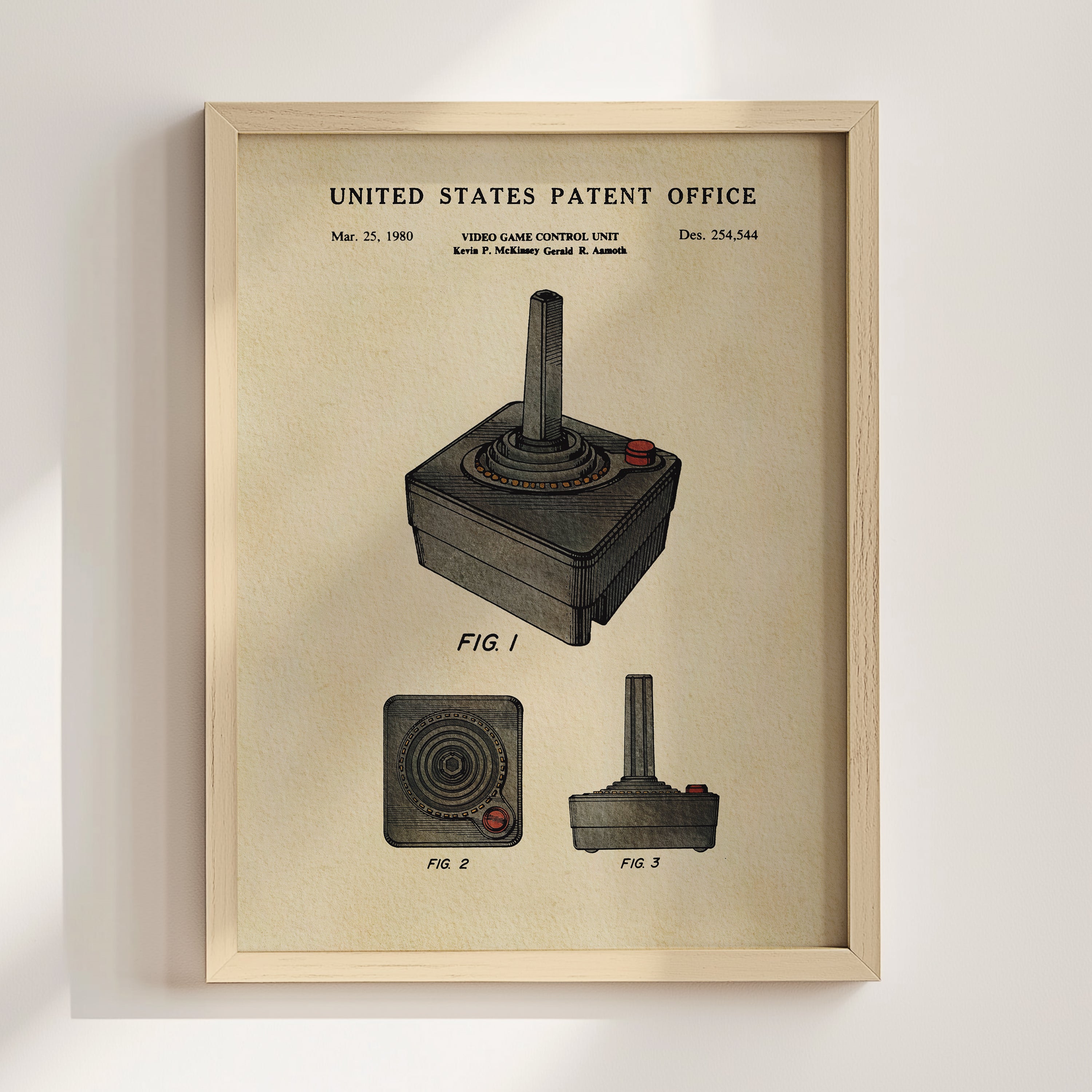 The image is a framed patent drawing of a video game controller, specifically a joystick, with various views of the controller.