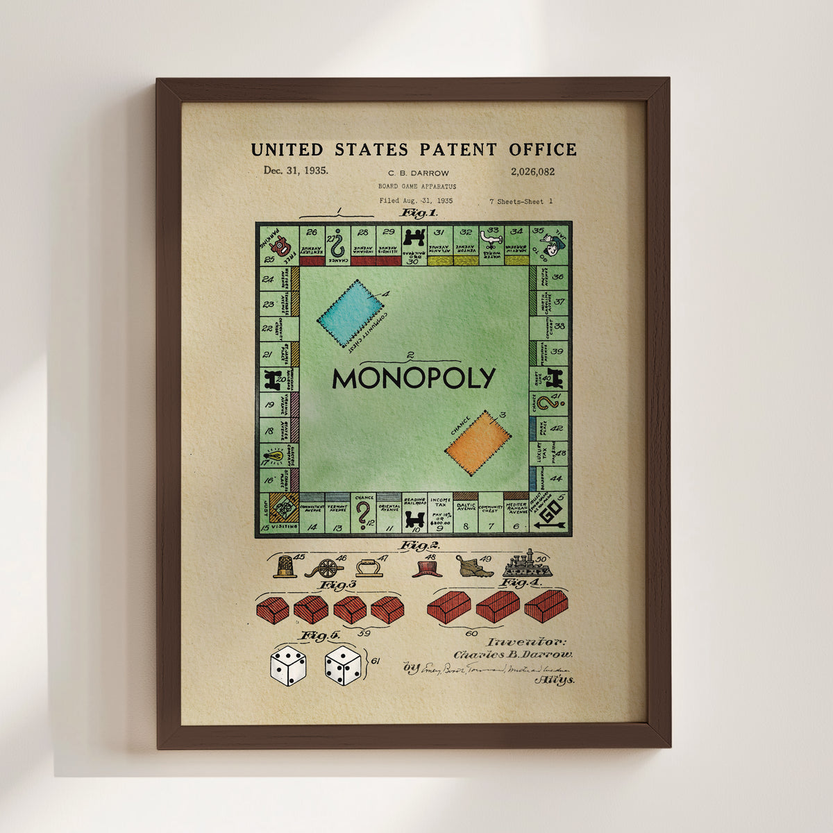 The image is a framed print of the Monopoly board game patent filing dated December 31, 1935, with a detailed illustration of the Monopoly board and its components.