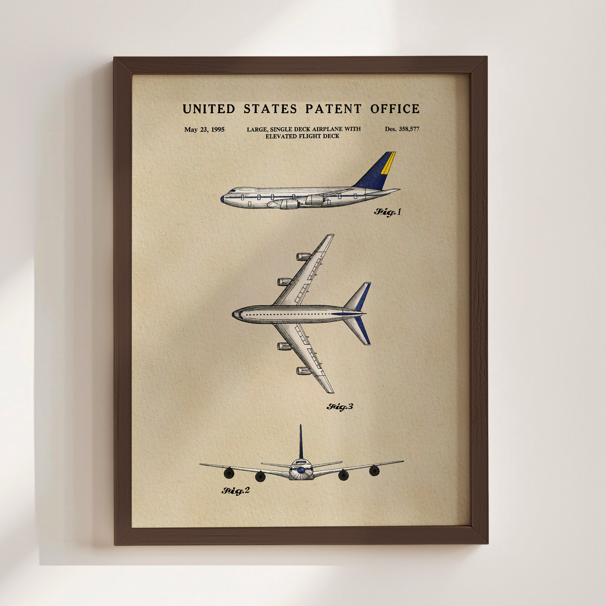 The image is a framed patent drawing depicting three different airplanes, including a large single-engine aircraft with an elevated flight deck.