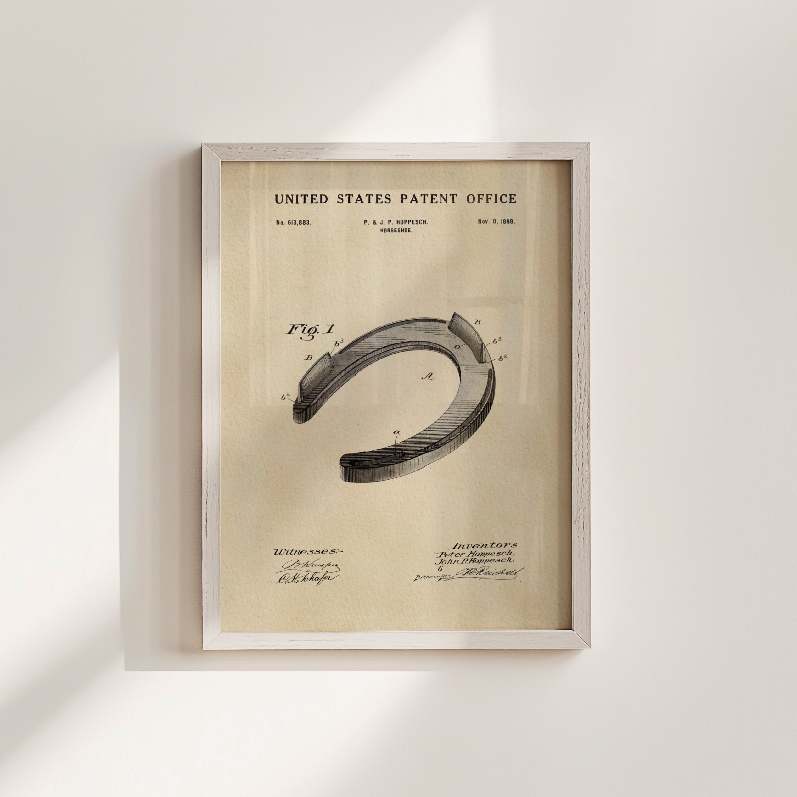 The image is a framed patent drawing of a horseshoe, depicting the design and features of the horseshoe.
