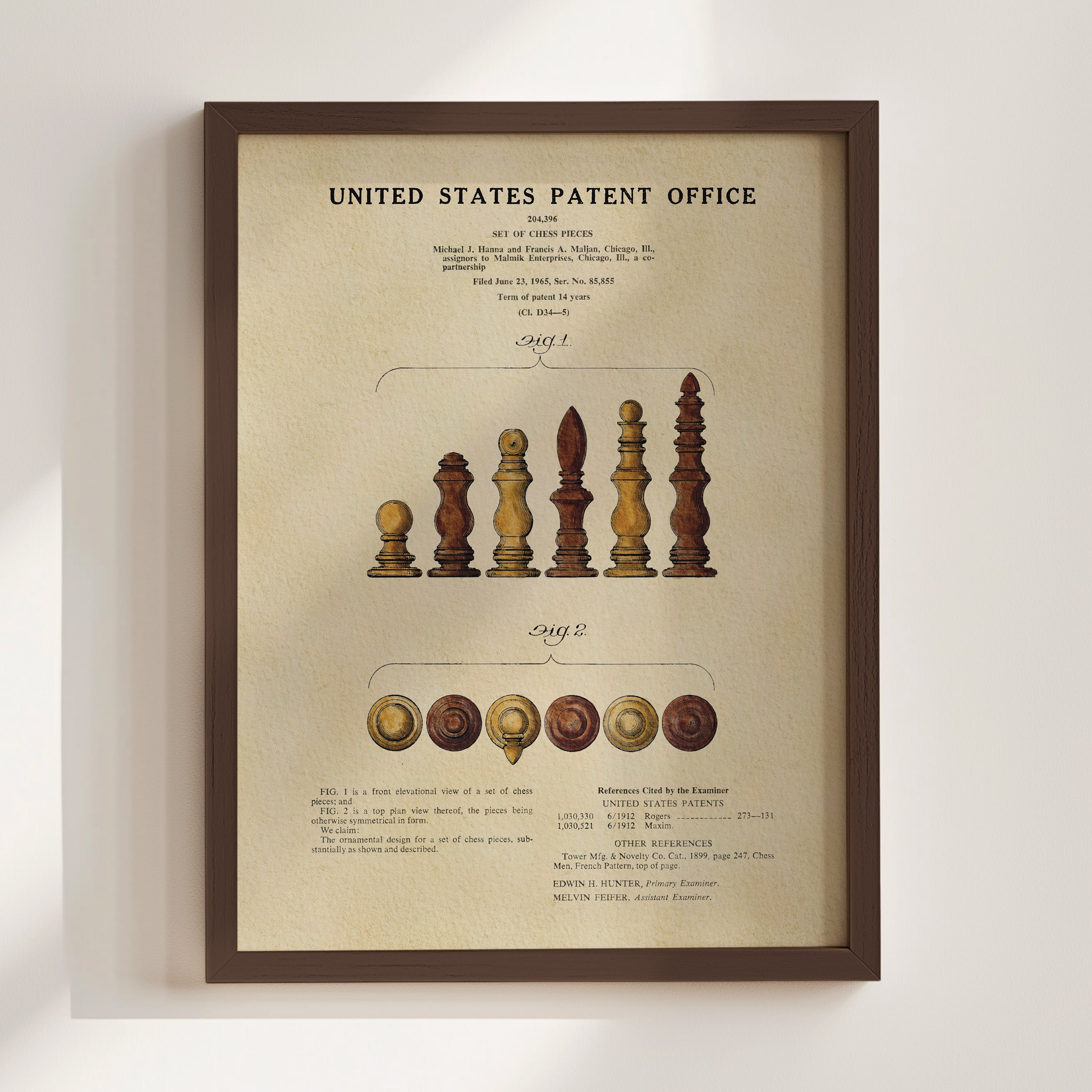 The image is a framed print of a United States patent office patent application, featuring a detailed diagram and text explaining the invention.