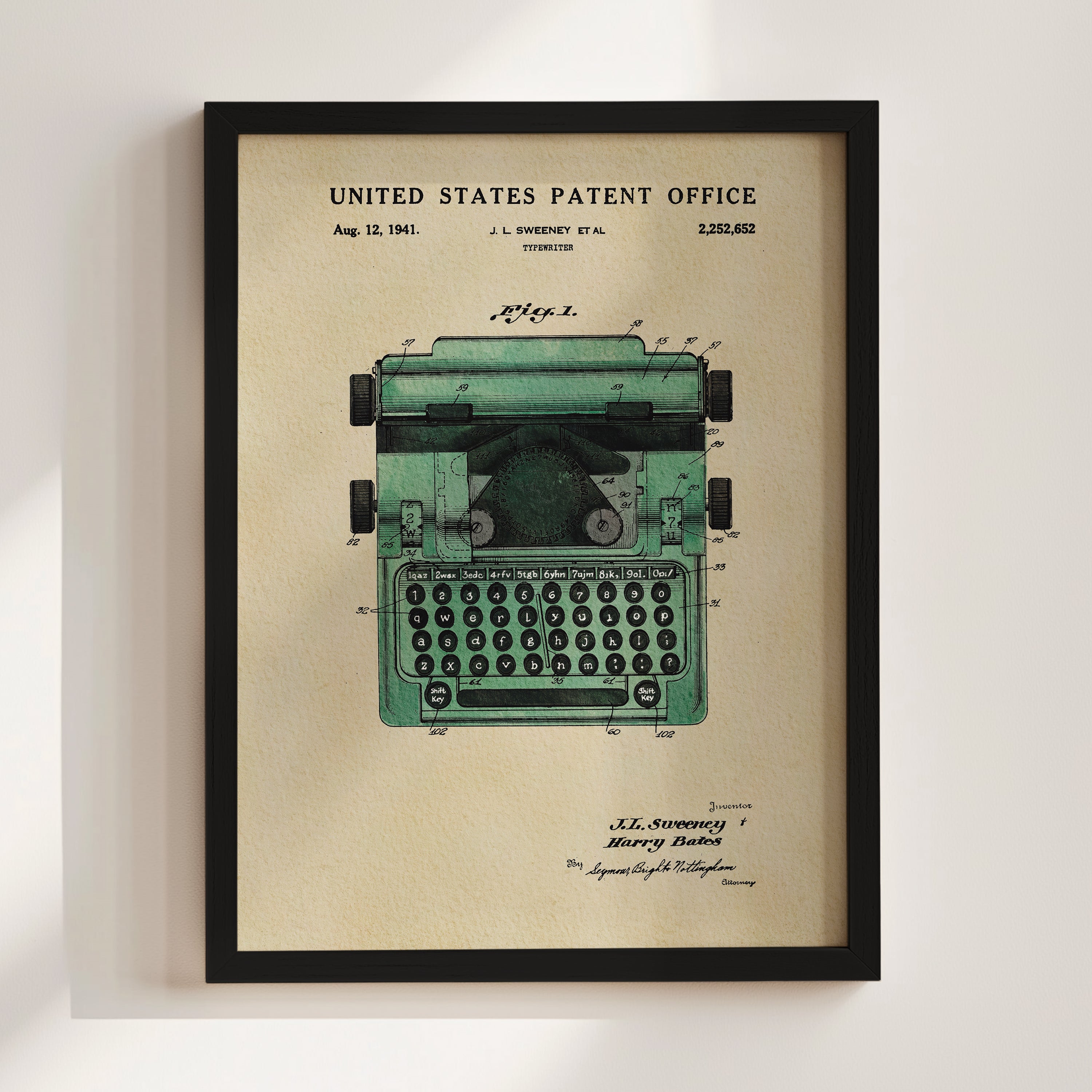 The image is a framed patent drawing of a typewriter, depicting the design and features of the device.