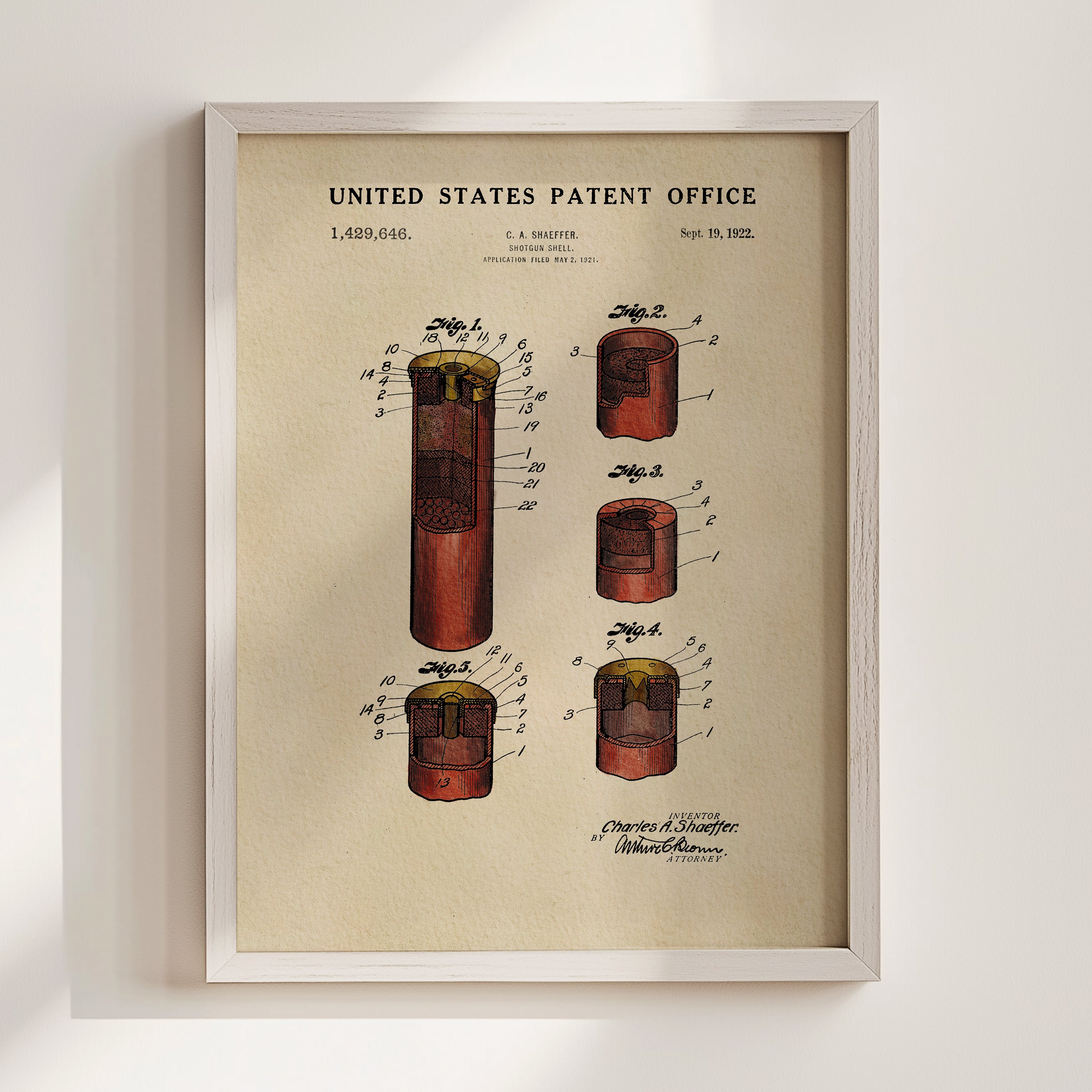 The image is a framed patent drawing depicting a device with multiple components, including a red cylinder, a yellow cylinder, and a red cylinder. The drawing is labeled with the United States Patent Office and includes a date of September 19, 1920.