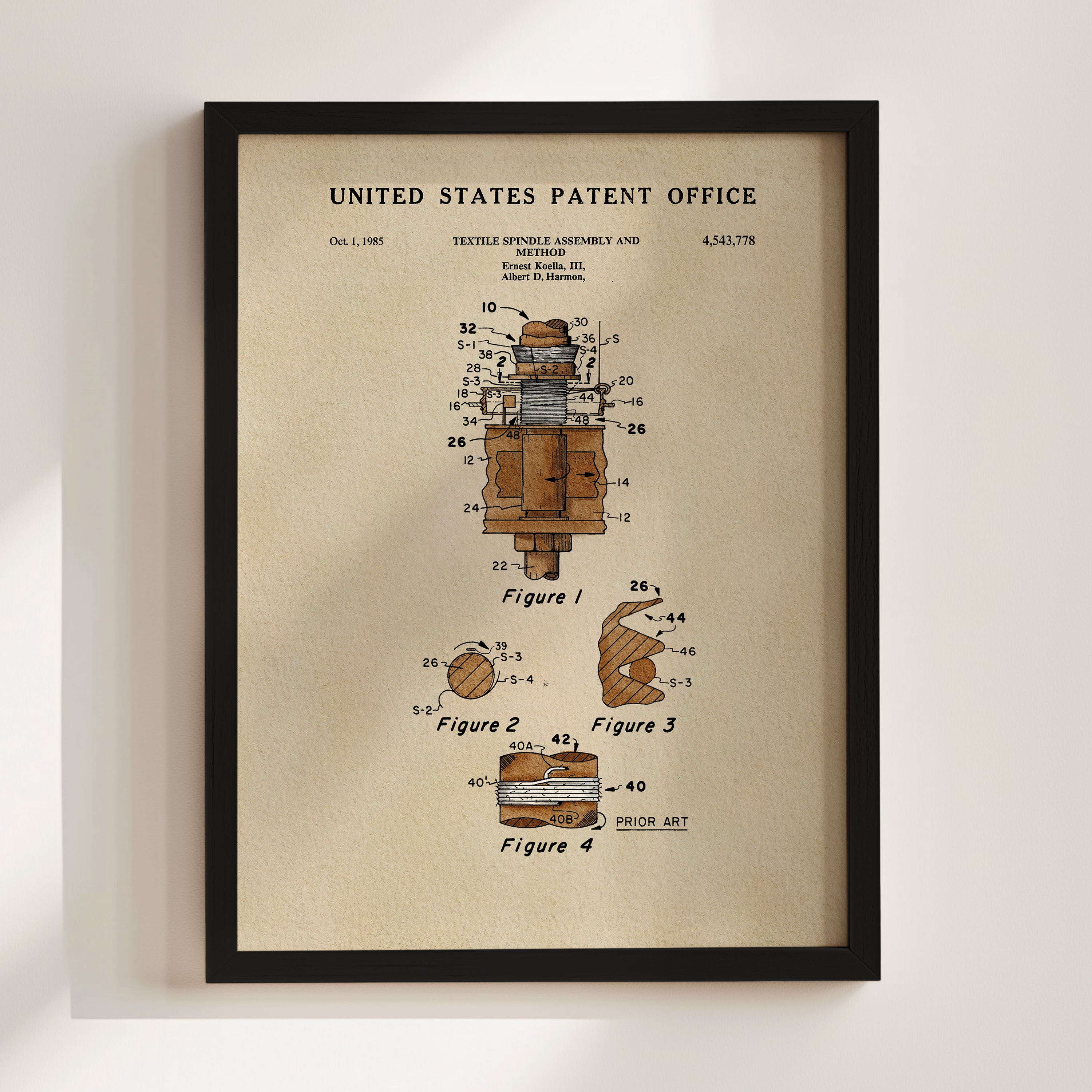 The image is a framed patent drawing depicting a textile spindle and a spinning wheel.
