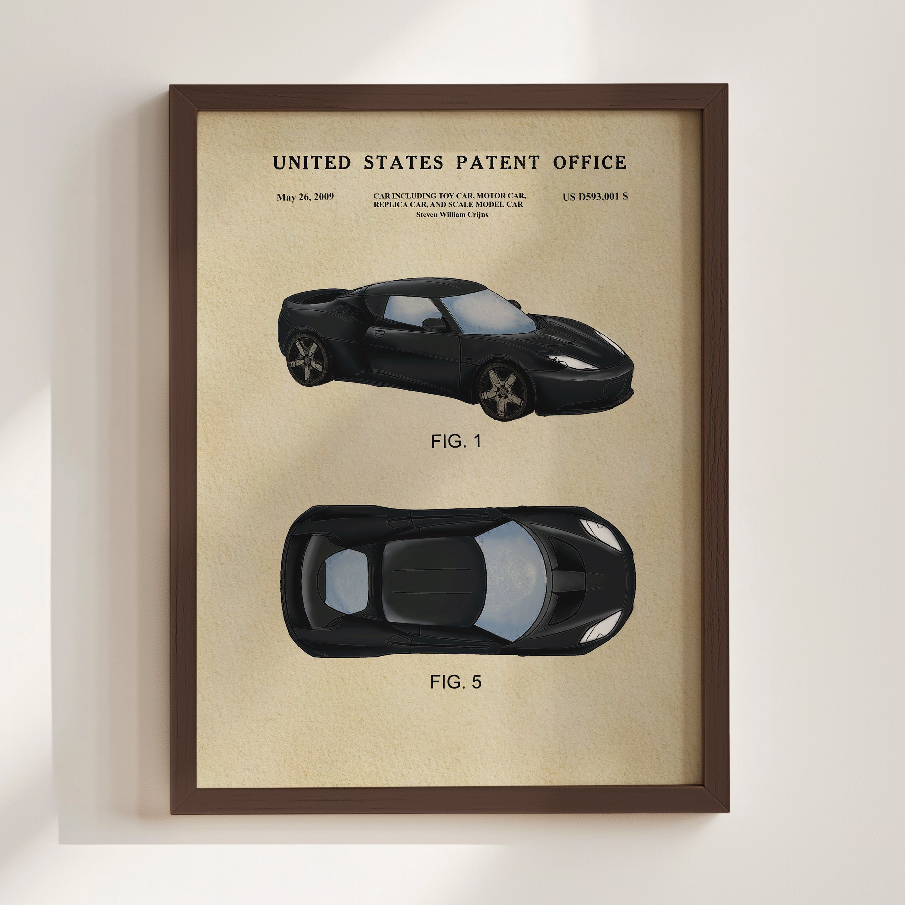 The image is a framed print featuring a black sports car, likely a high-performance model, with two different views of the car, one from the front and one from the side.