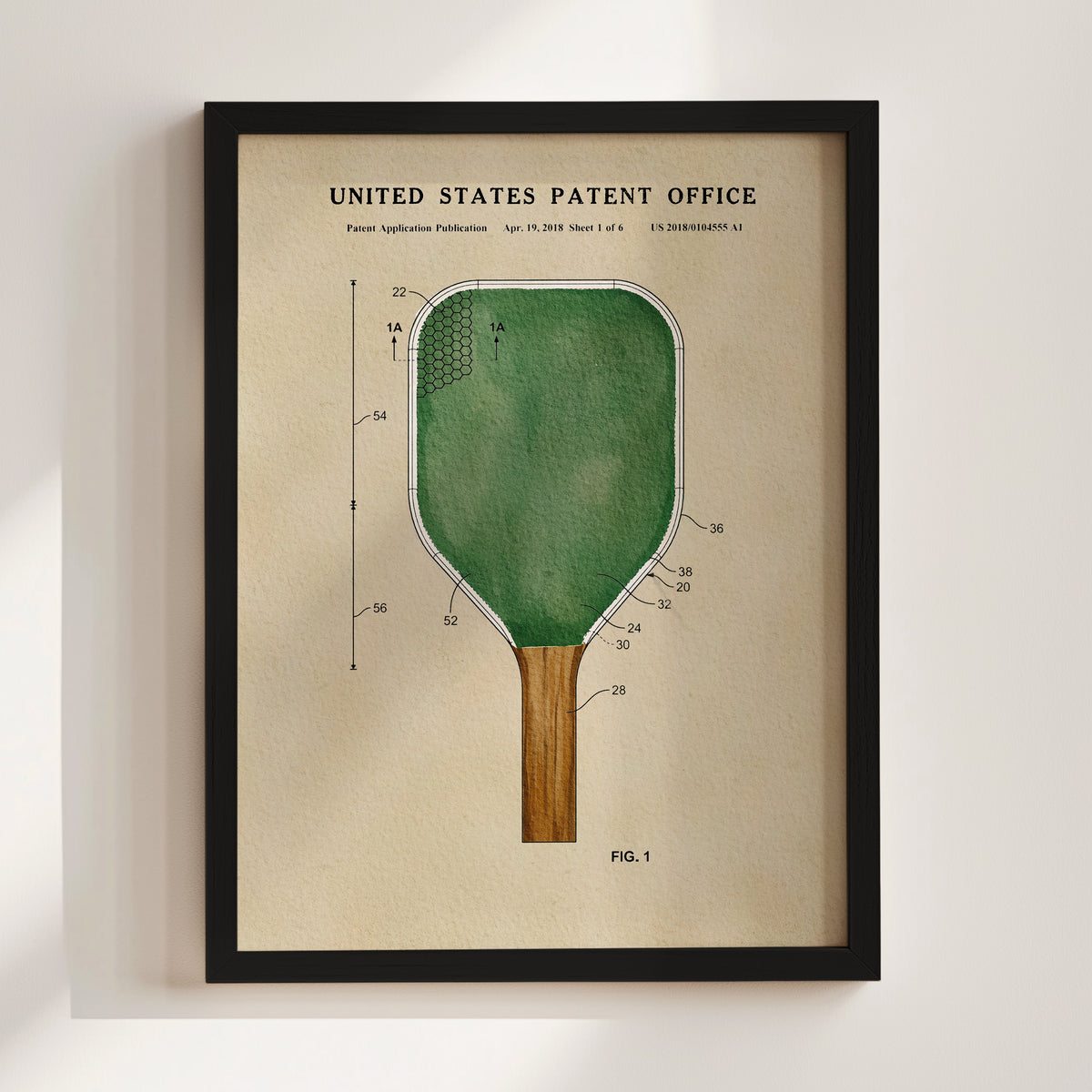 The image is a framed patent drawing of a paddle, depicting the design and features of the paddle in a detailed manner.