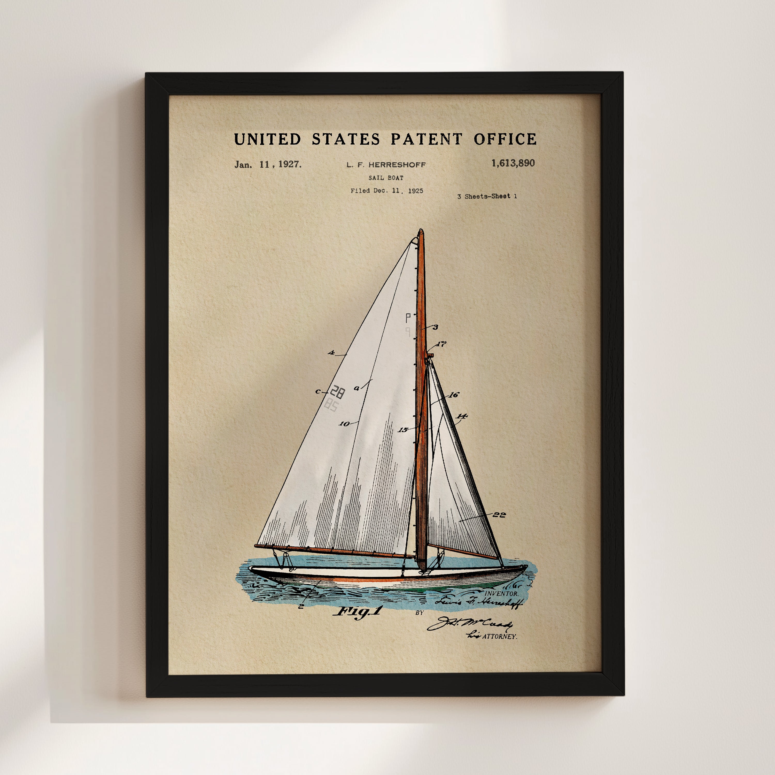 A framed illustration of a sailboat with a United States patent office sign in the background.