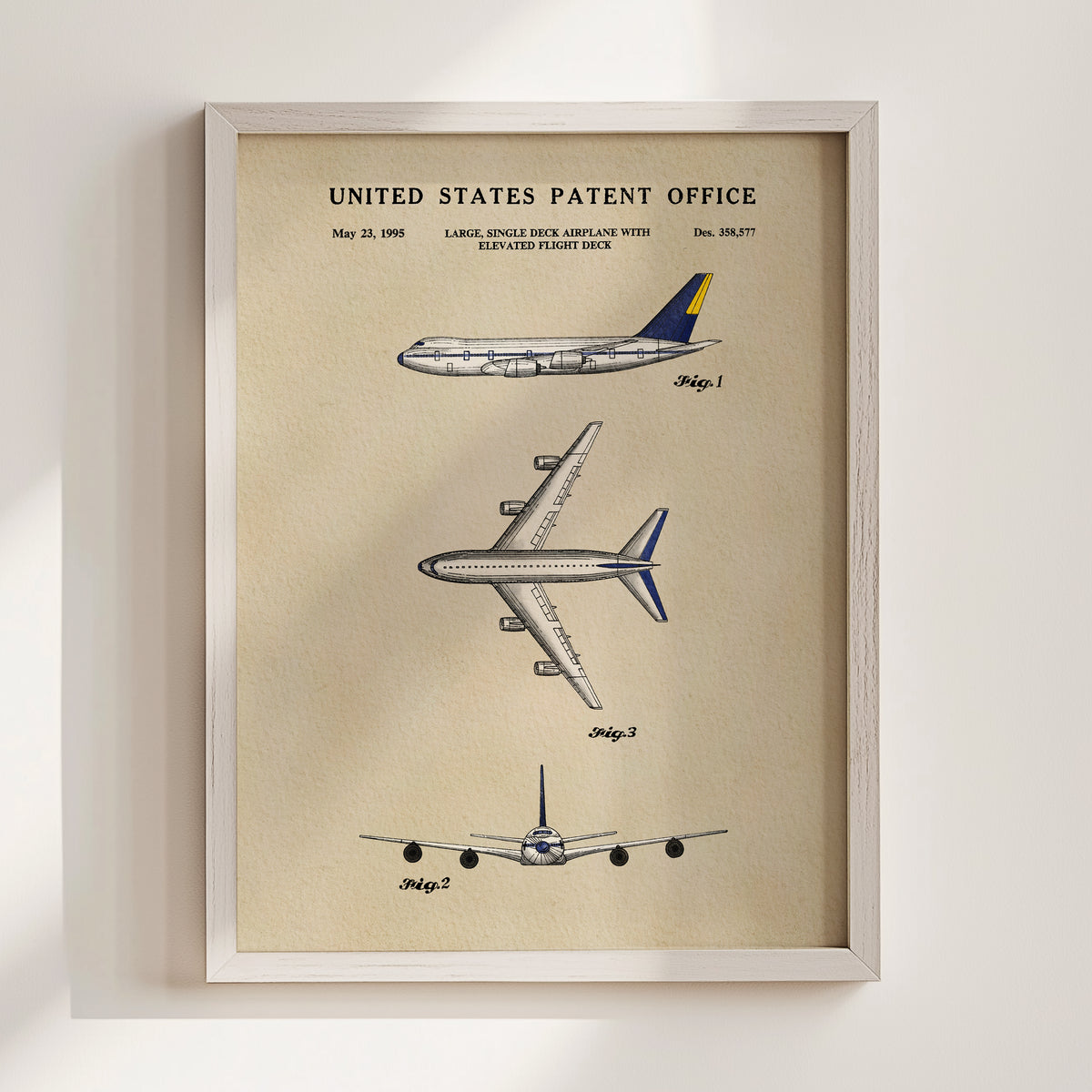 The image is a framed patent drawing depicting three different airplanes, including a large single-engine airplane with an elevated flight deck.