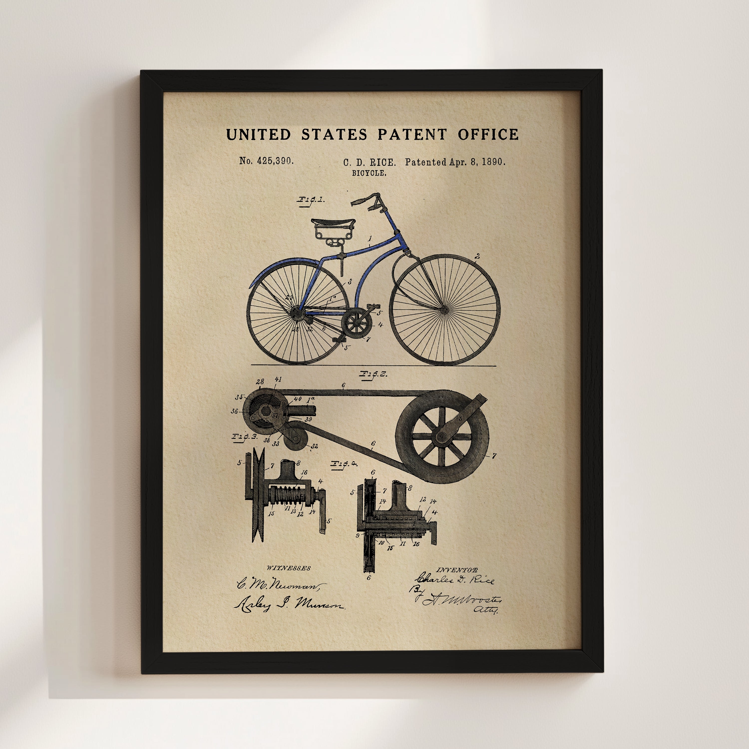 The image is a framed vintage patent drawing of a bicycle, depicting the design and construction of the bicycle.