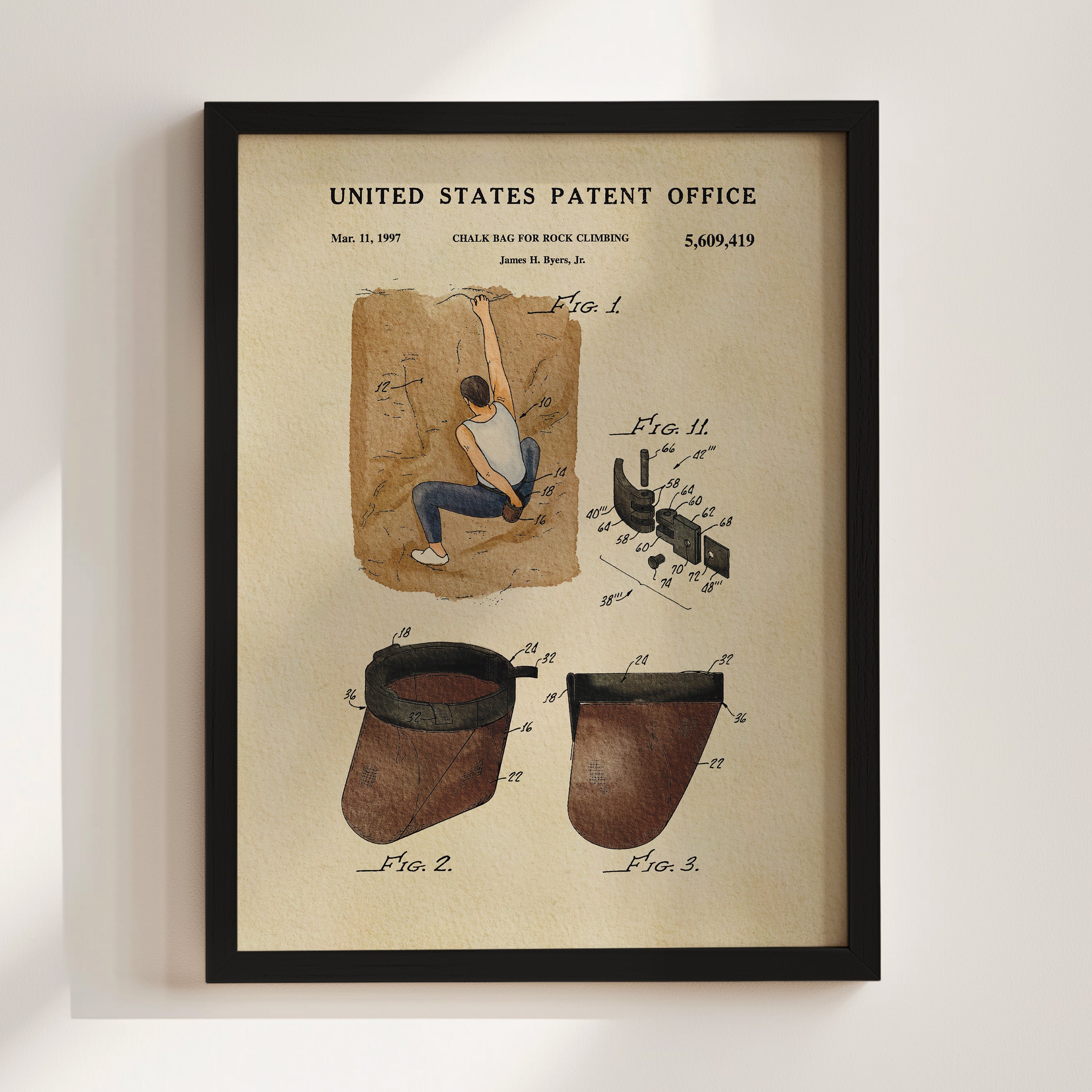 The image is a framed patent drawing depicting a man climbing a rock face, with detailed technical drawings and annotations.