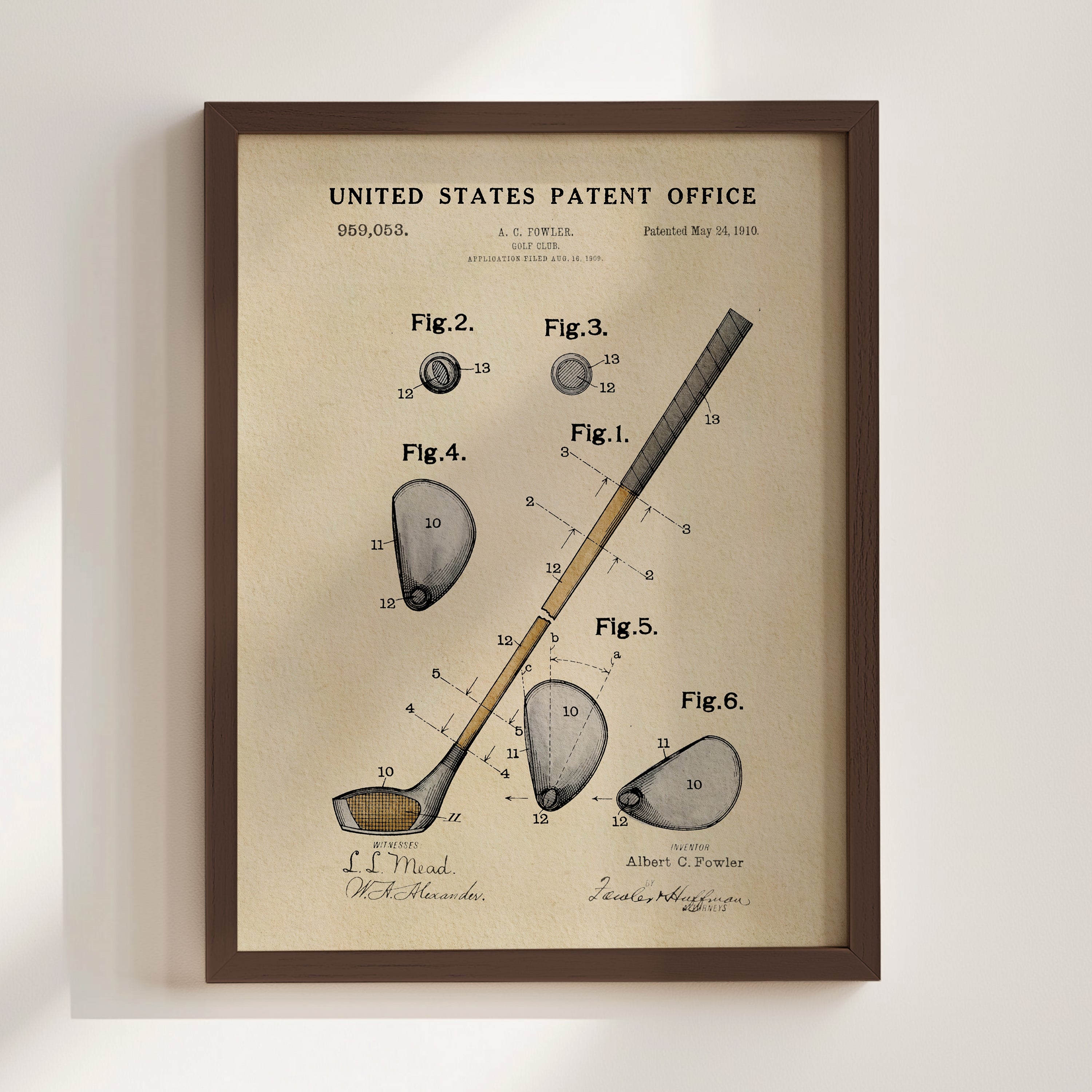 The image is a framed print of a United States patent office patent from 1910, depicting a golf club and its components.