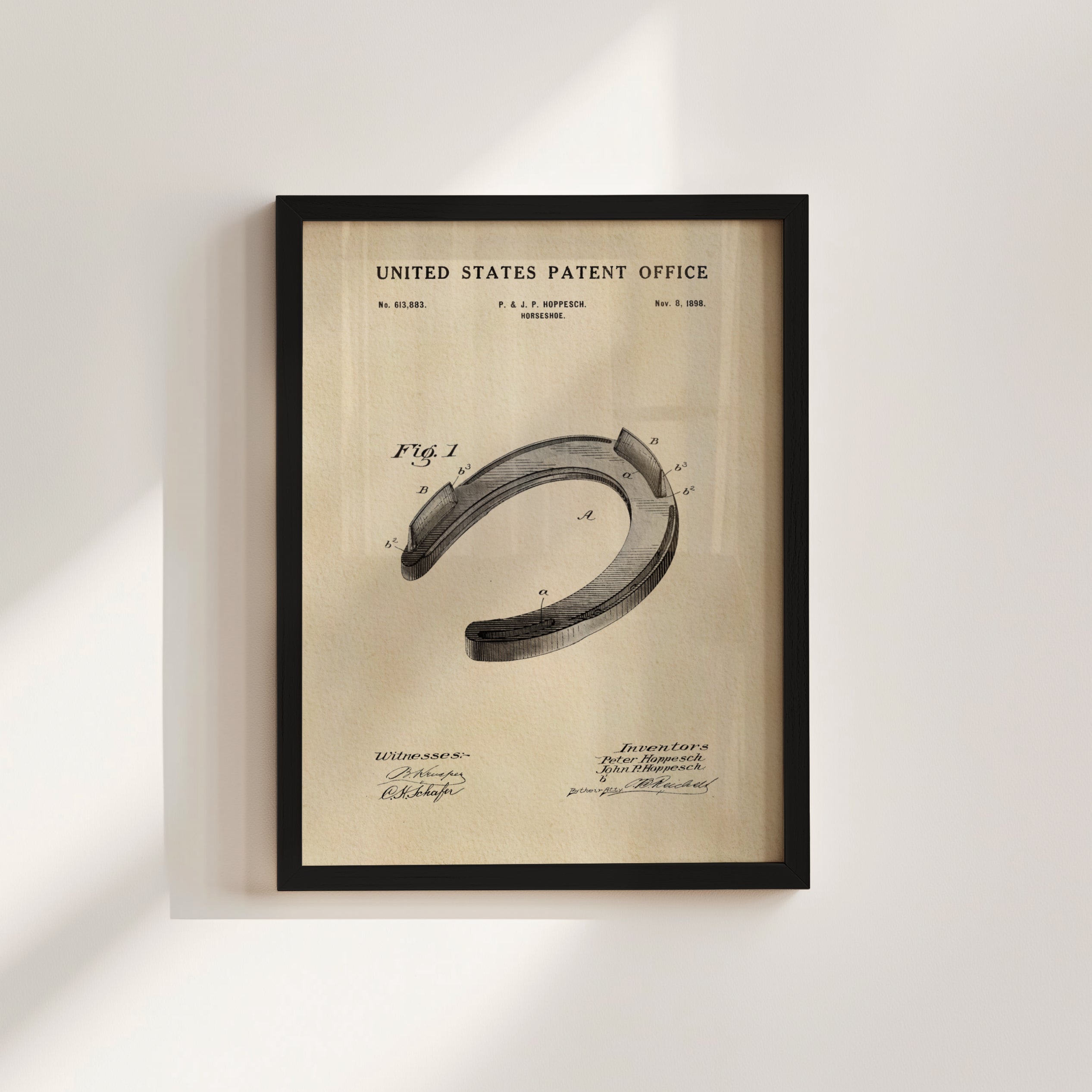 The image is a framed patent drawing of a horseshoe, depicting the design and features of the horseshoe.