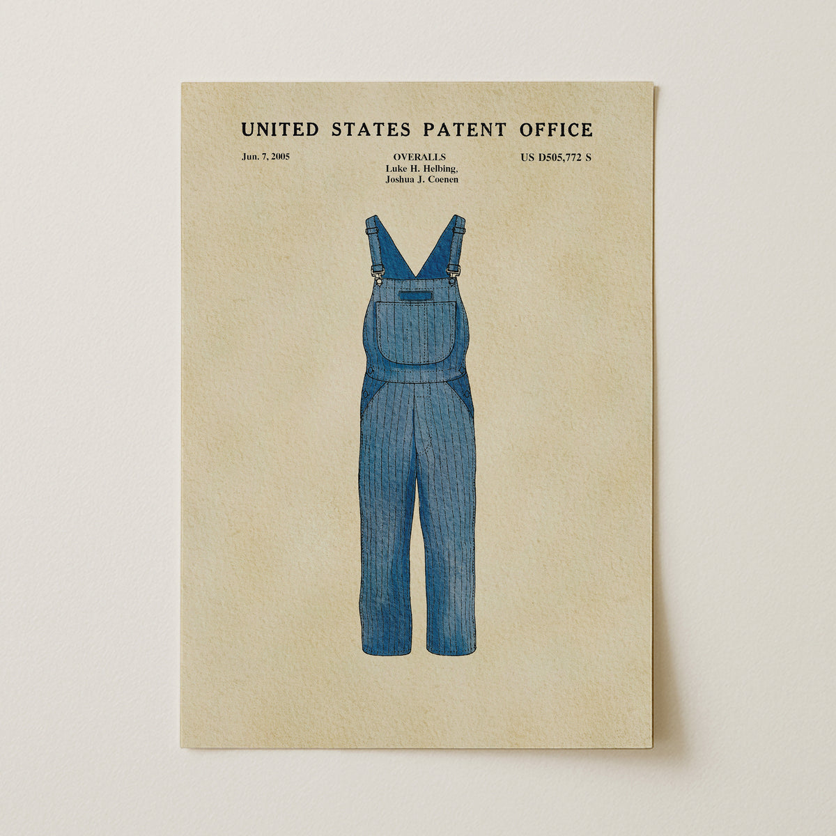 A framed illustration of a pair of blue overalls with the text "United States Patent Office" and "Jun. 7, 2005" printed on it.