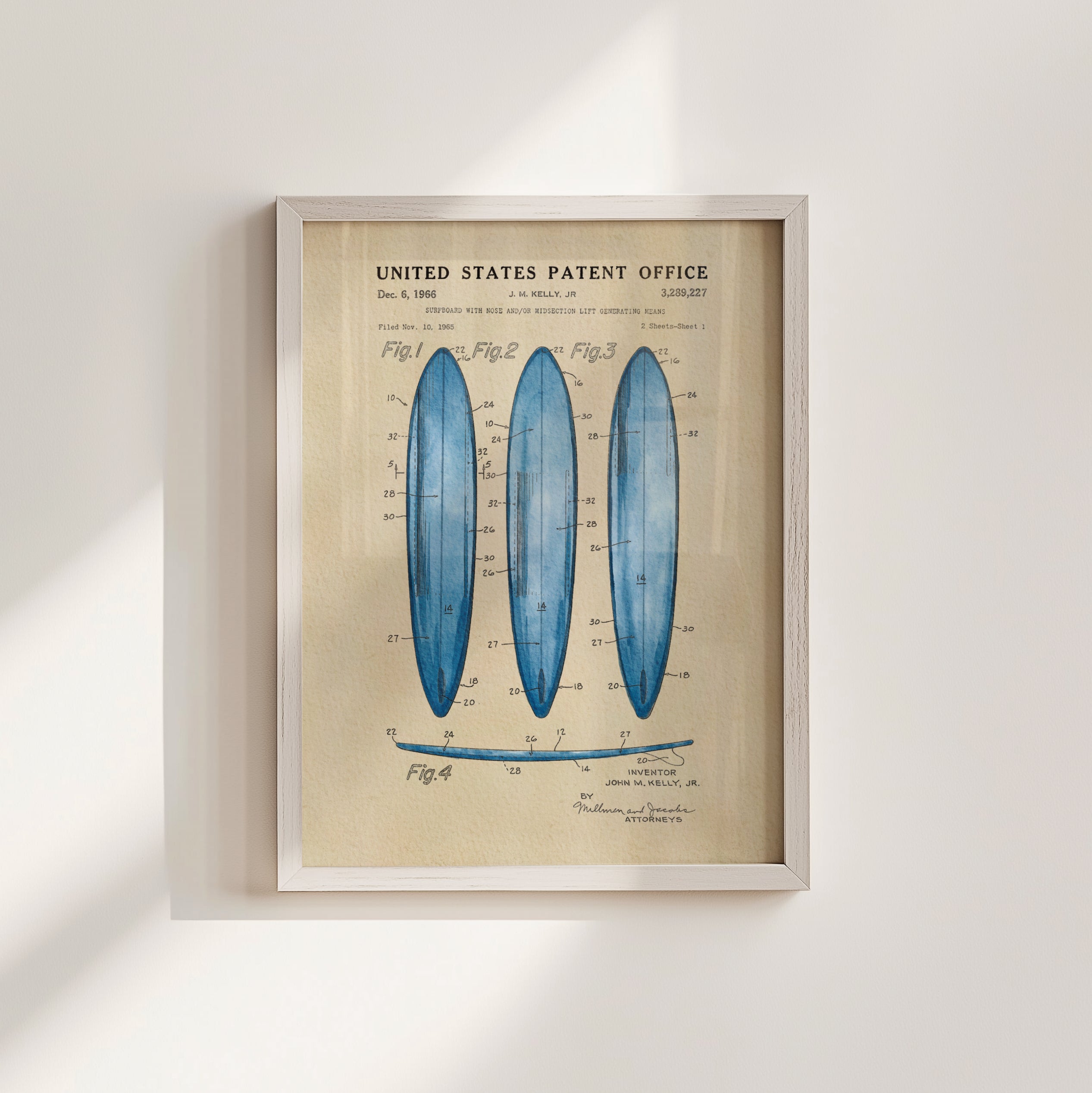 The image is a framed vintage patent drawing depicting three blue surfboards with detailed technical drawings and labels.