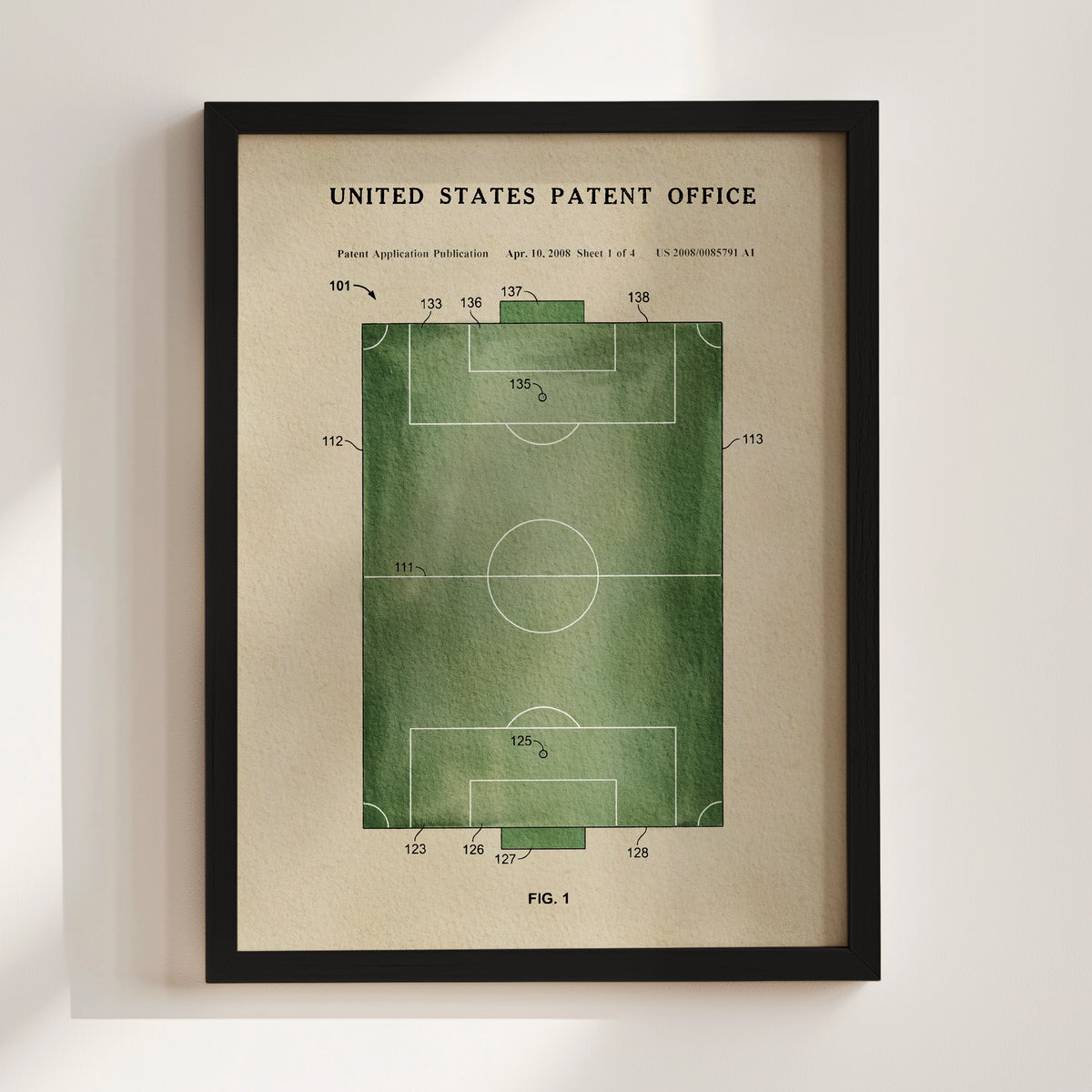 The image is a framed print depicting a patent application for a soccer field, with a title "United States Patent Office" at the top and a diagram of the field with dimensions and markings.