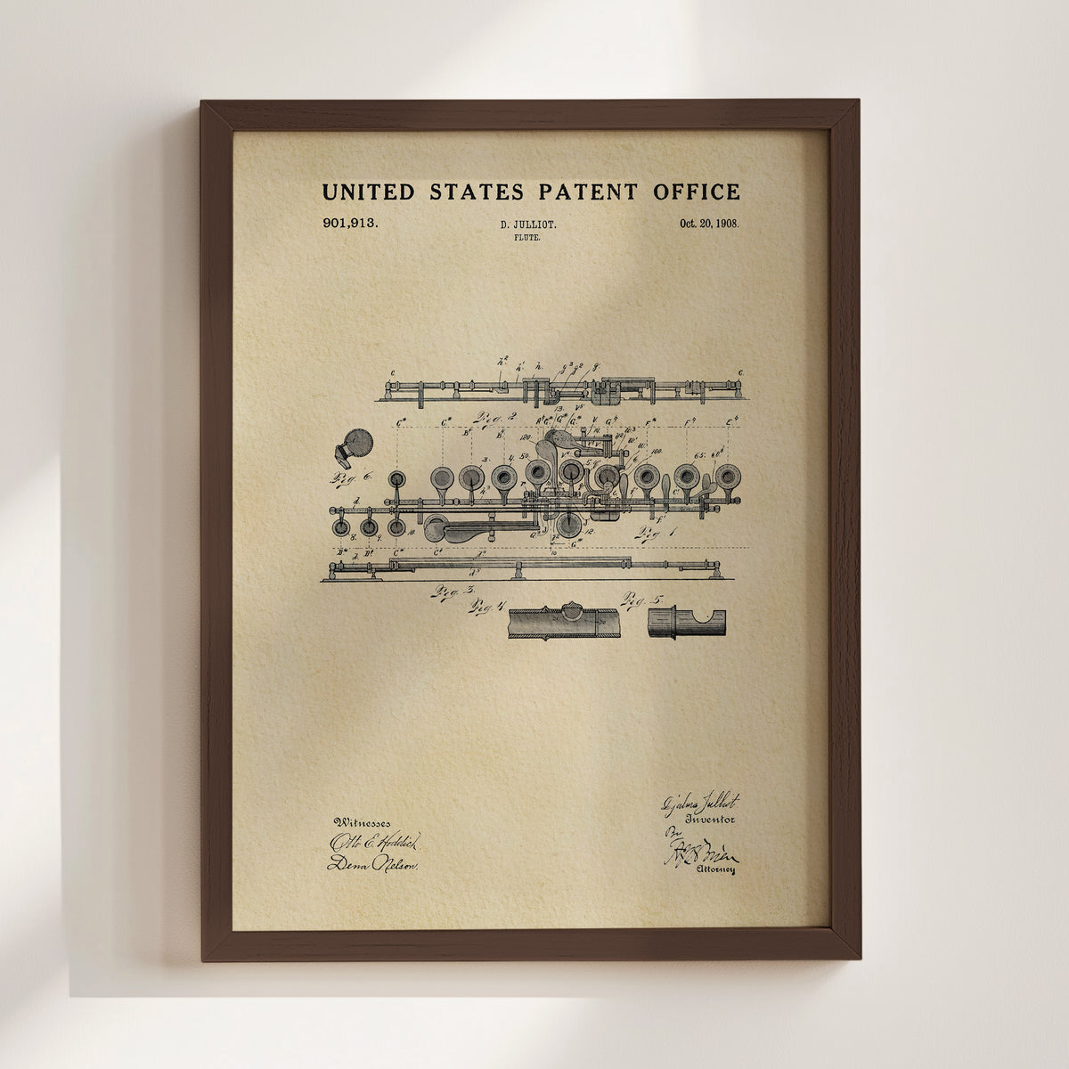 The image is a framed patent drawing from the United States Patent Office, depicting a musical instrument with detailed technical drawings and inventors' signatures.