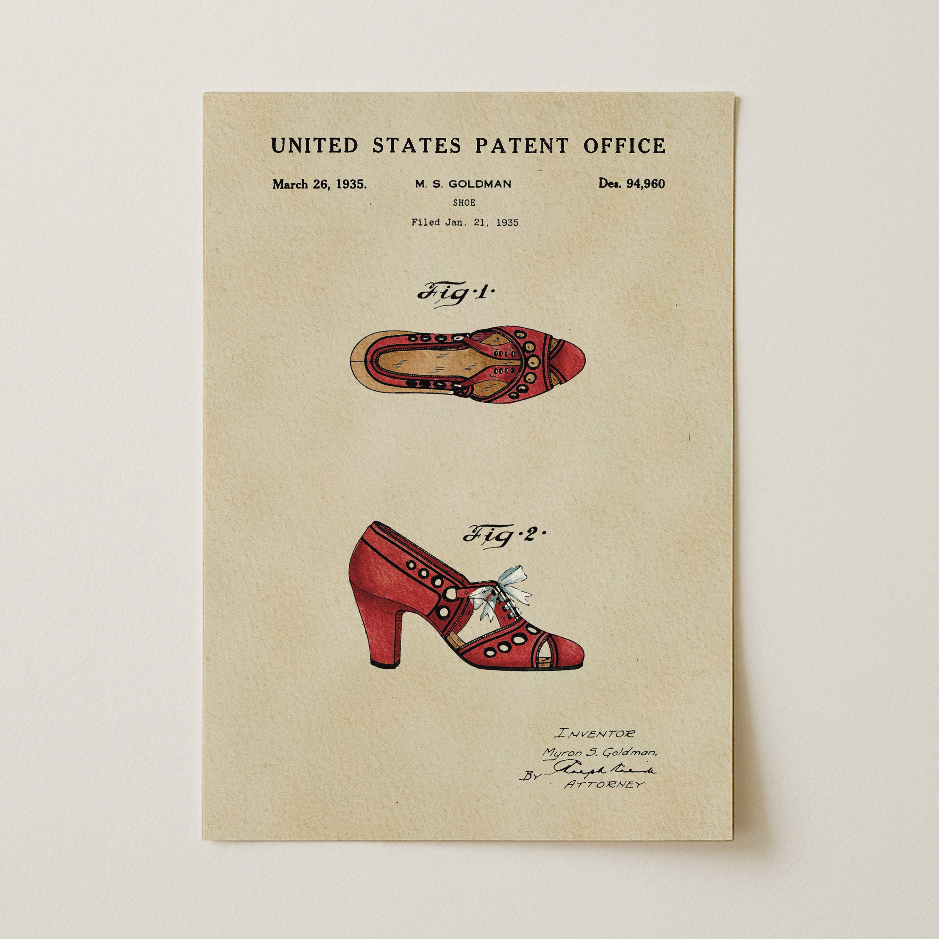 The image is a framed patent drawing depicting a pair of red high-heeled shoes with decorative elements.