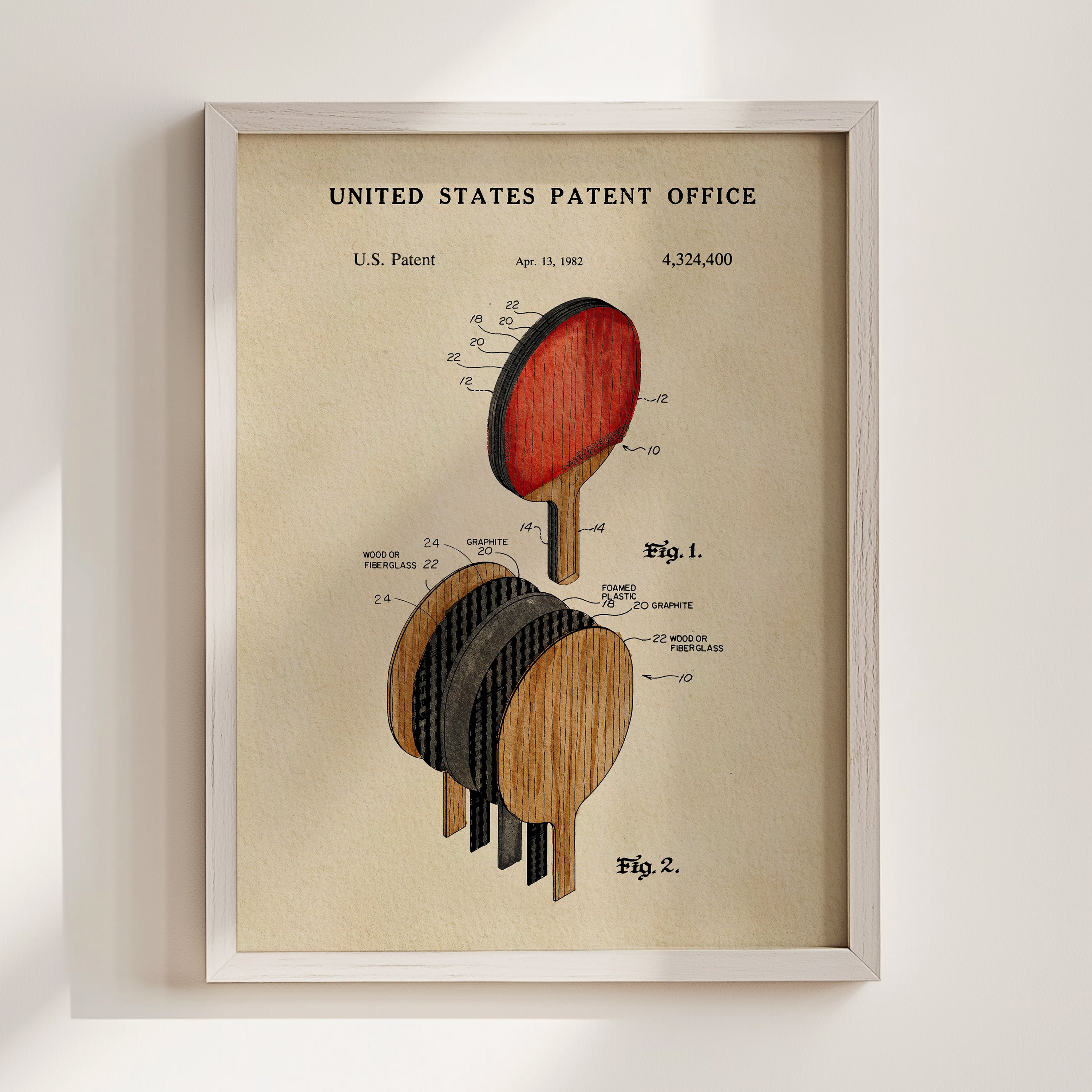The image is a framed vintage patent drawing of a paddle, depicting the design and features of the paddle in a detailed manner.