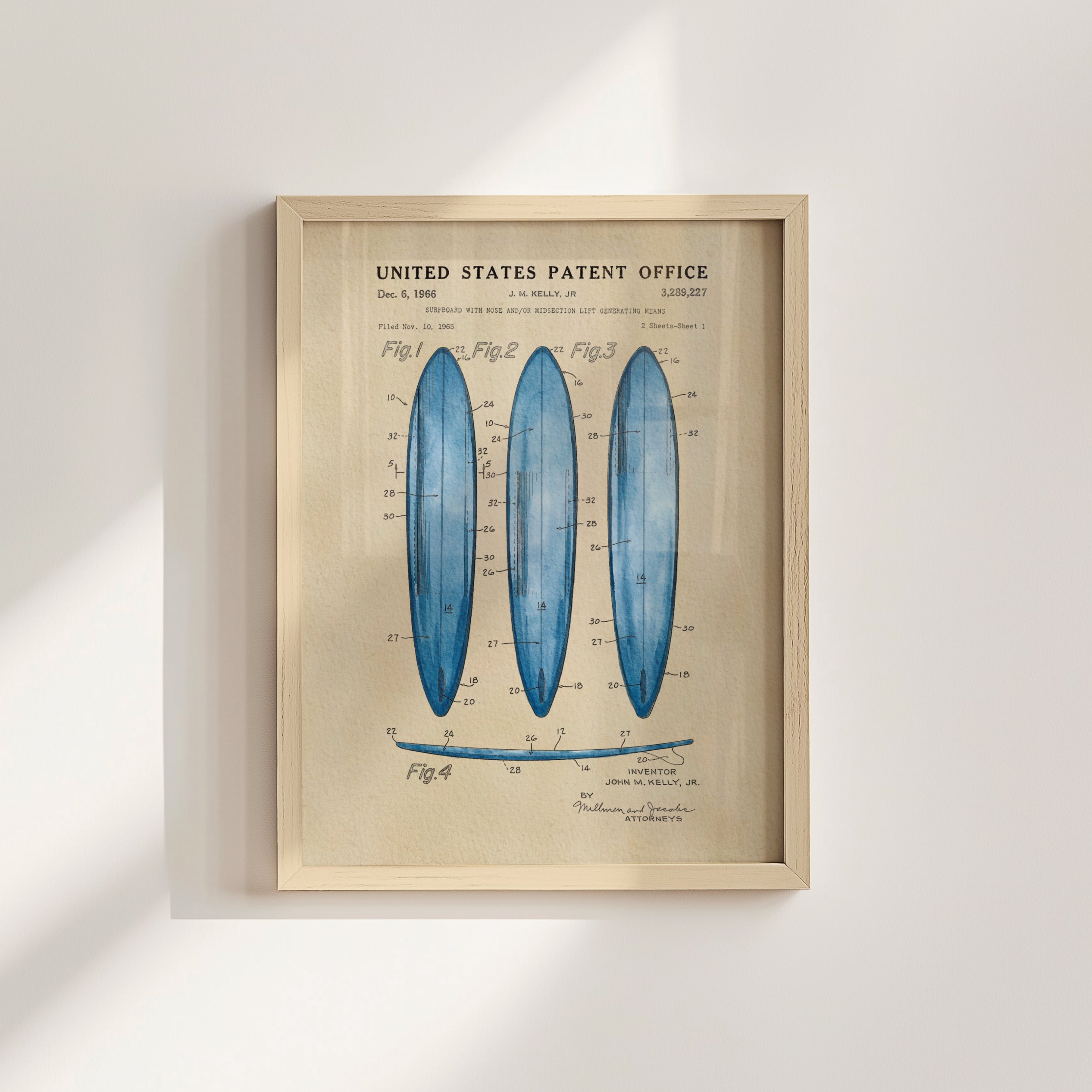 The image is a framed patent drawing depicting three blue surfboards with various technical drawings and labels.