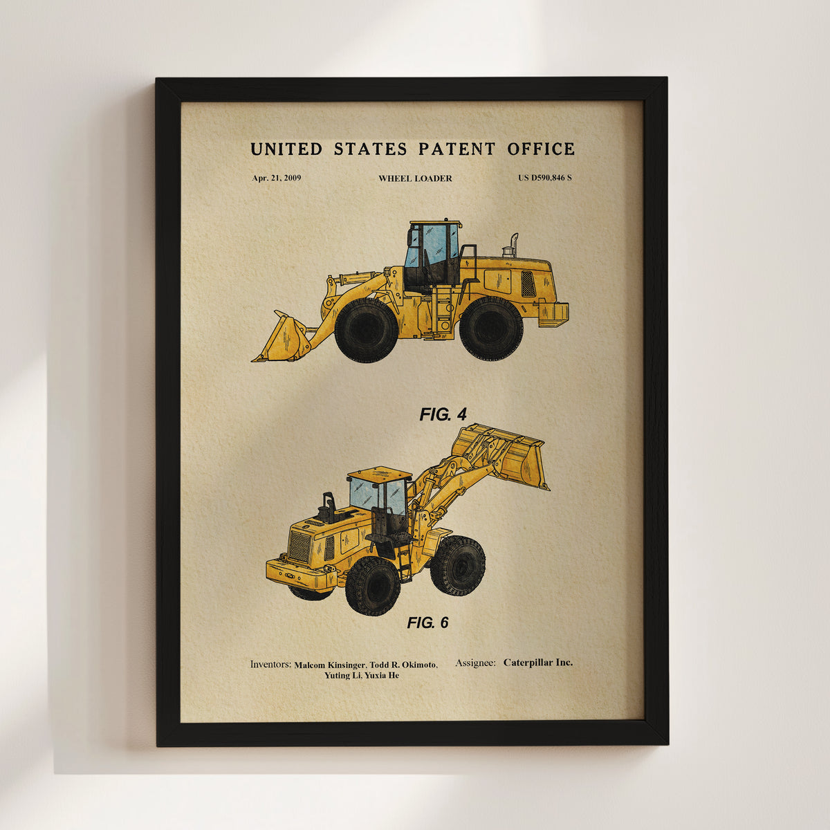 The image is a framed patent drawing of a wheel loader, depicting two different models with detailed illustrations.