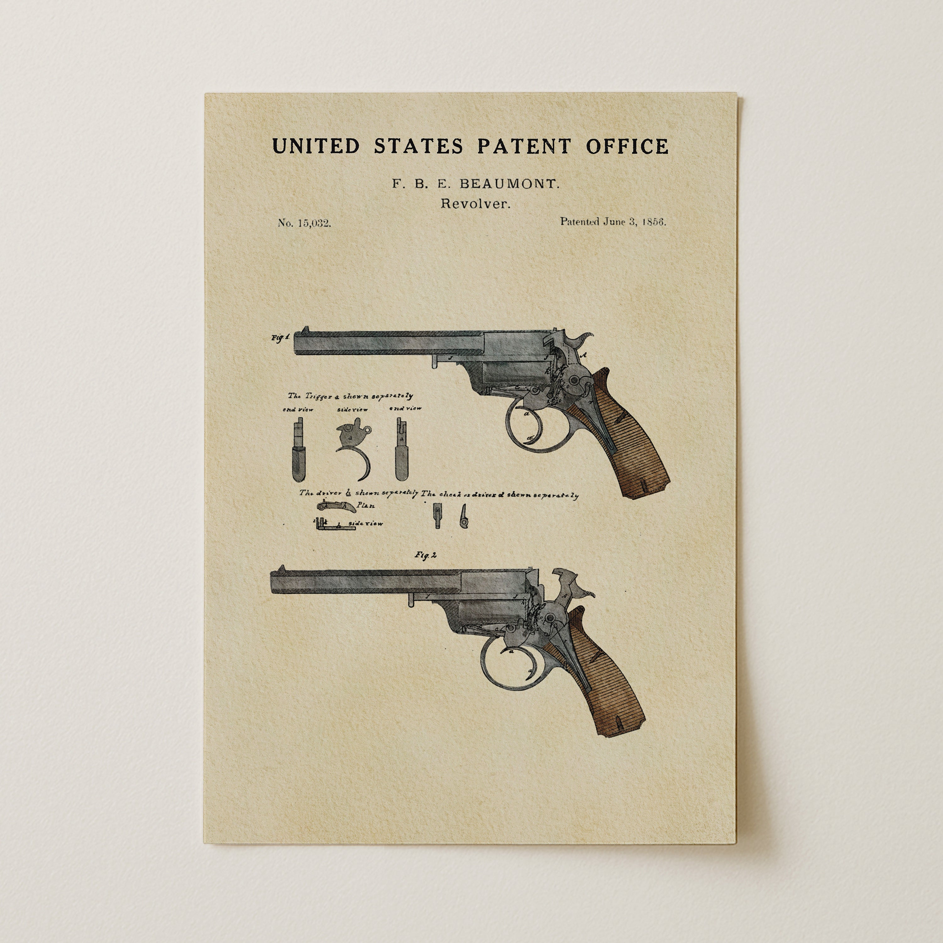 The image is a printed page from the United States Patent Office, featuring a detailed illustration of a handgun with accompanying technical drawings and text.