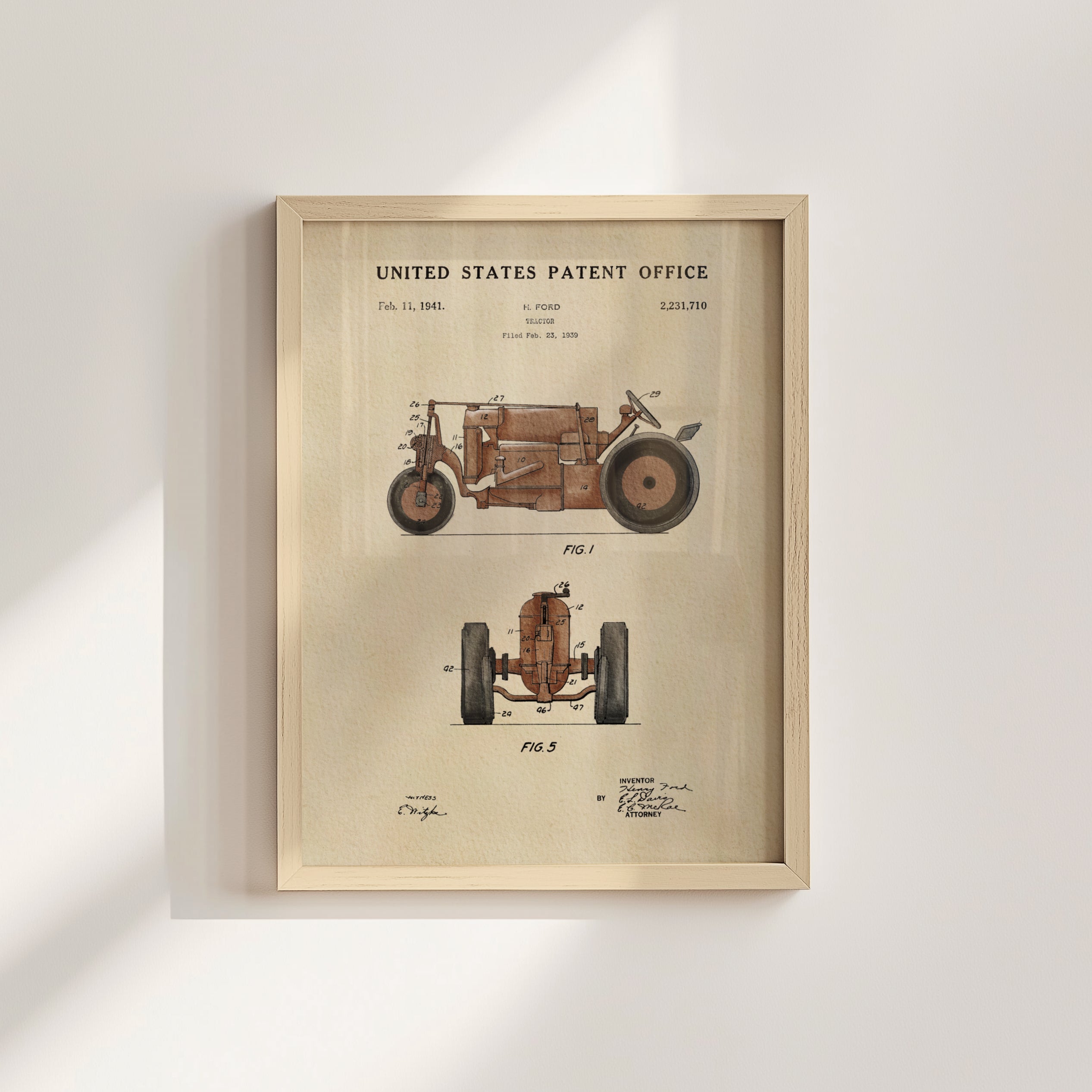 The image is a framed patent drawing of a vehicle, specifically a tractor, with detailed technical drawings and specifications.