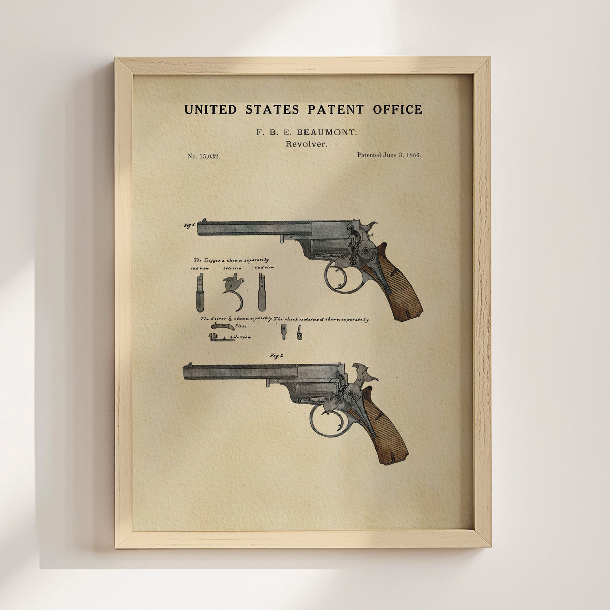 The image is a framed patent drawing of a Revolver, depicting the design and features of the gun.