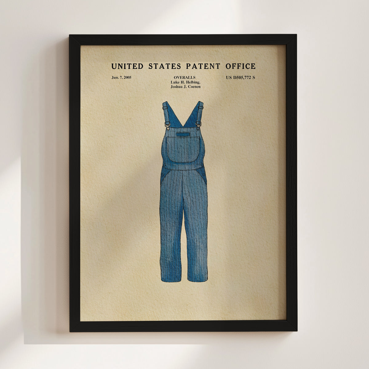 A printed page from the United States Patent Office, featuring an illustration of a pair of blue overalls with the text "United States Patent Office" and "Jun. 7, 2005" printed on it.