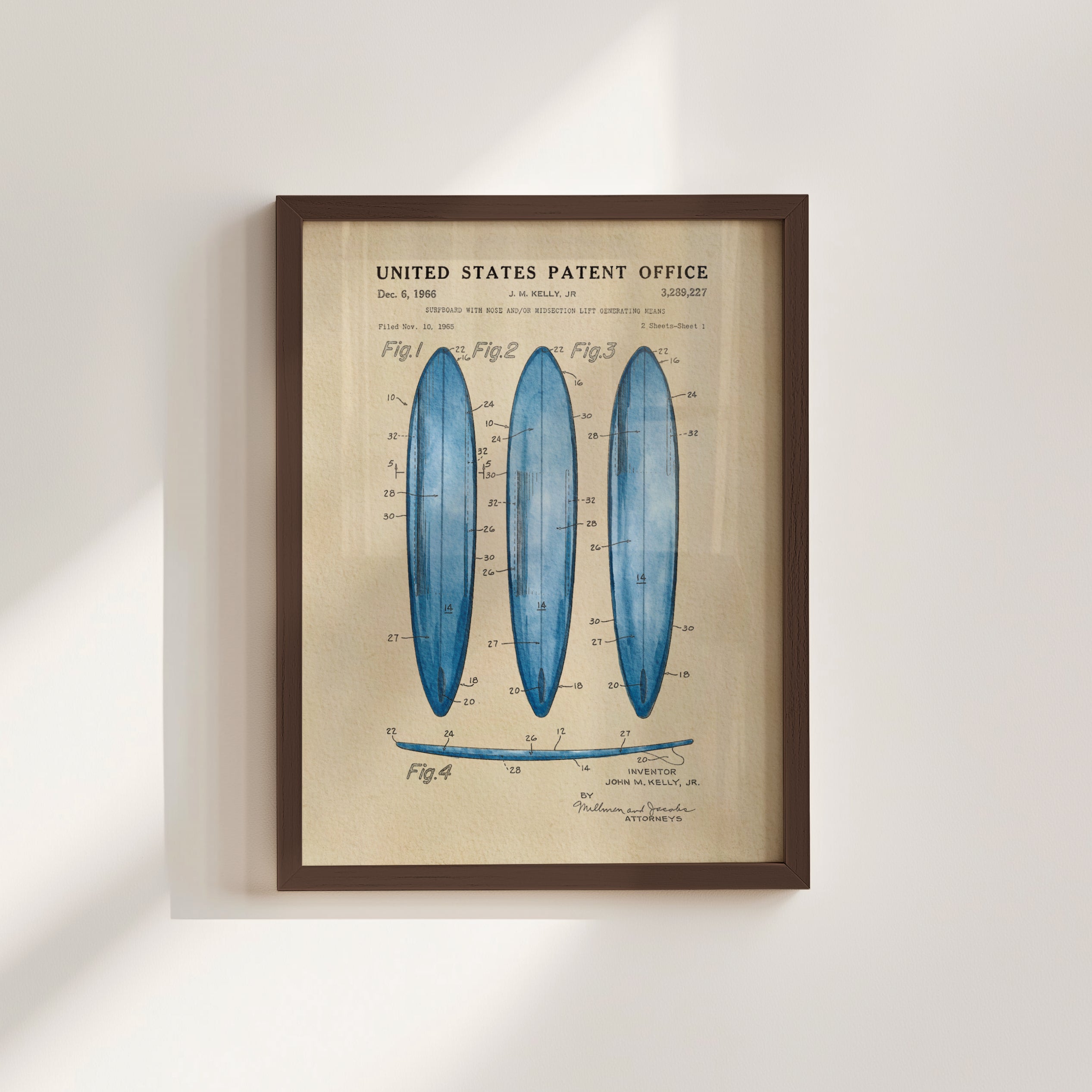 The image is a framed vintage patent drawing depicting three blue surfboards with detailed technical drawings and labels.