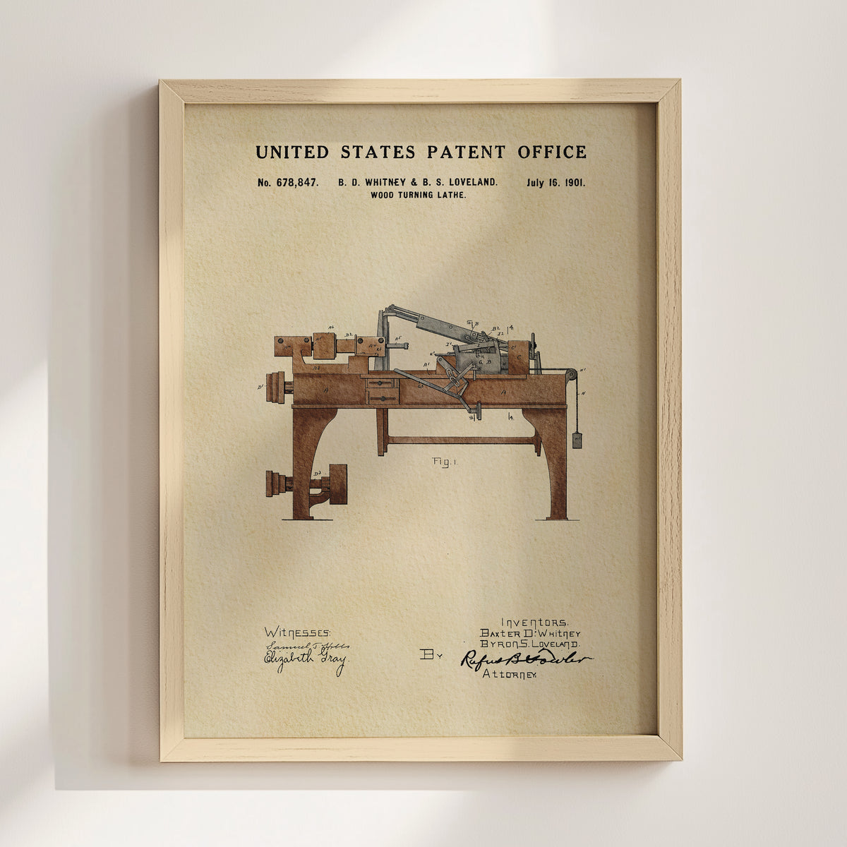 The image is a framed patent drawing of a wood lathe, depicting the invention by B. E. Whitney & B. E. Leveland on July 16, 1901.