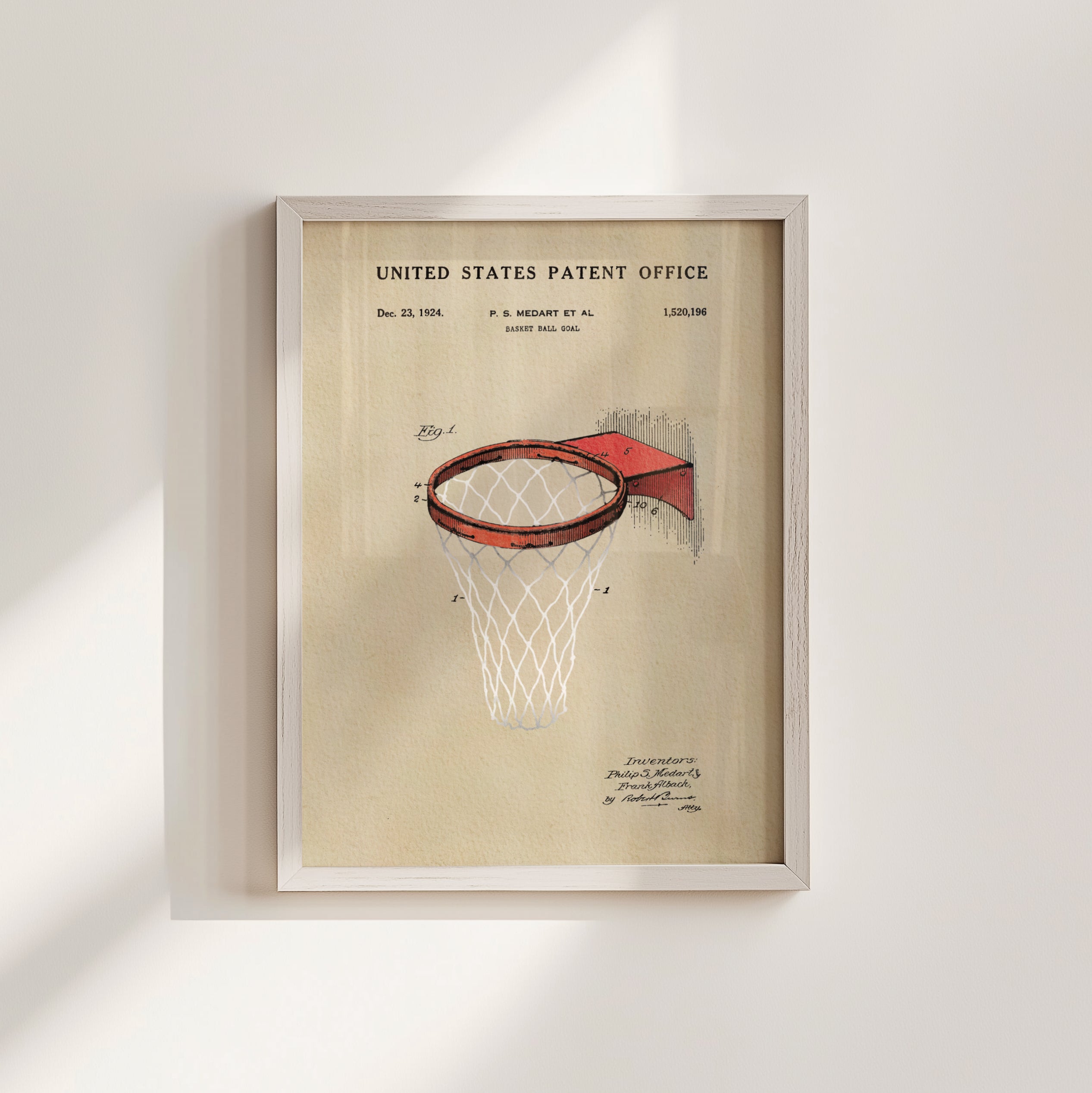 The image is a framed patent drawing of a basketball hoop, depicting the net and the backboard.
