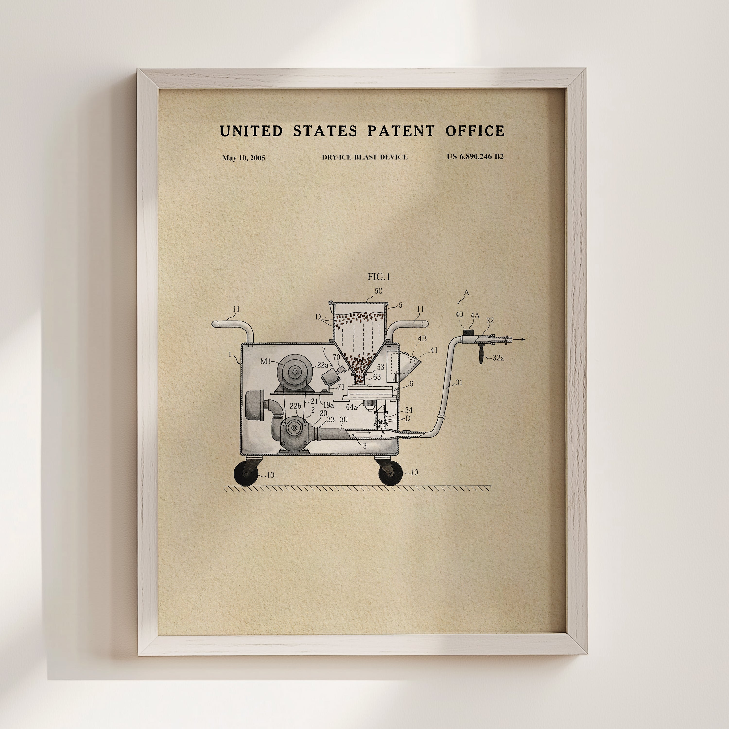 The image is a framed patent drawing depicting a machine or device with various technical drawings and labels.