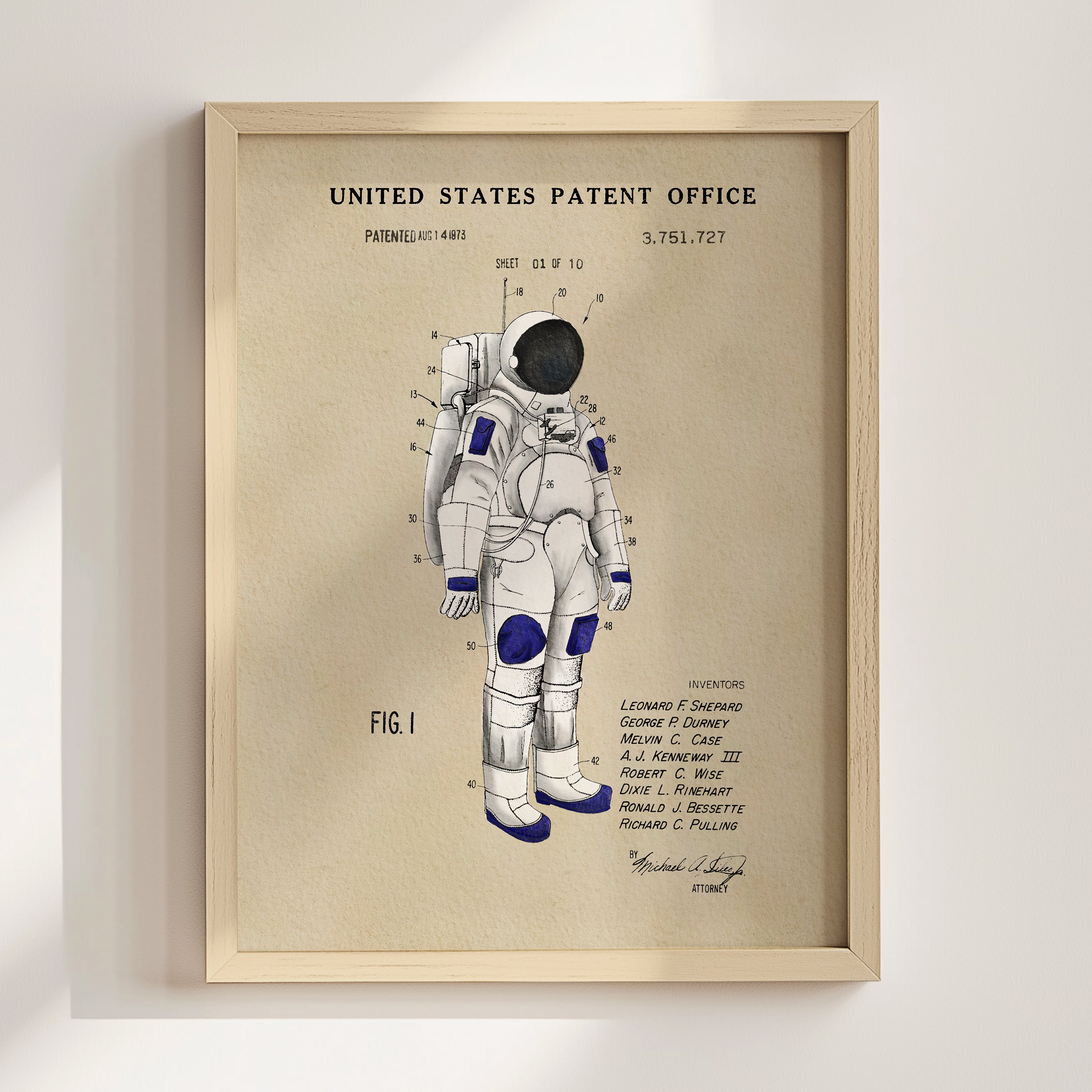 The image is a framed patent drawing of an astronaut's spacesuit, depicting the design and features of the suit.