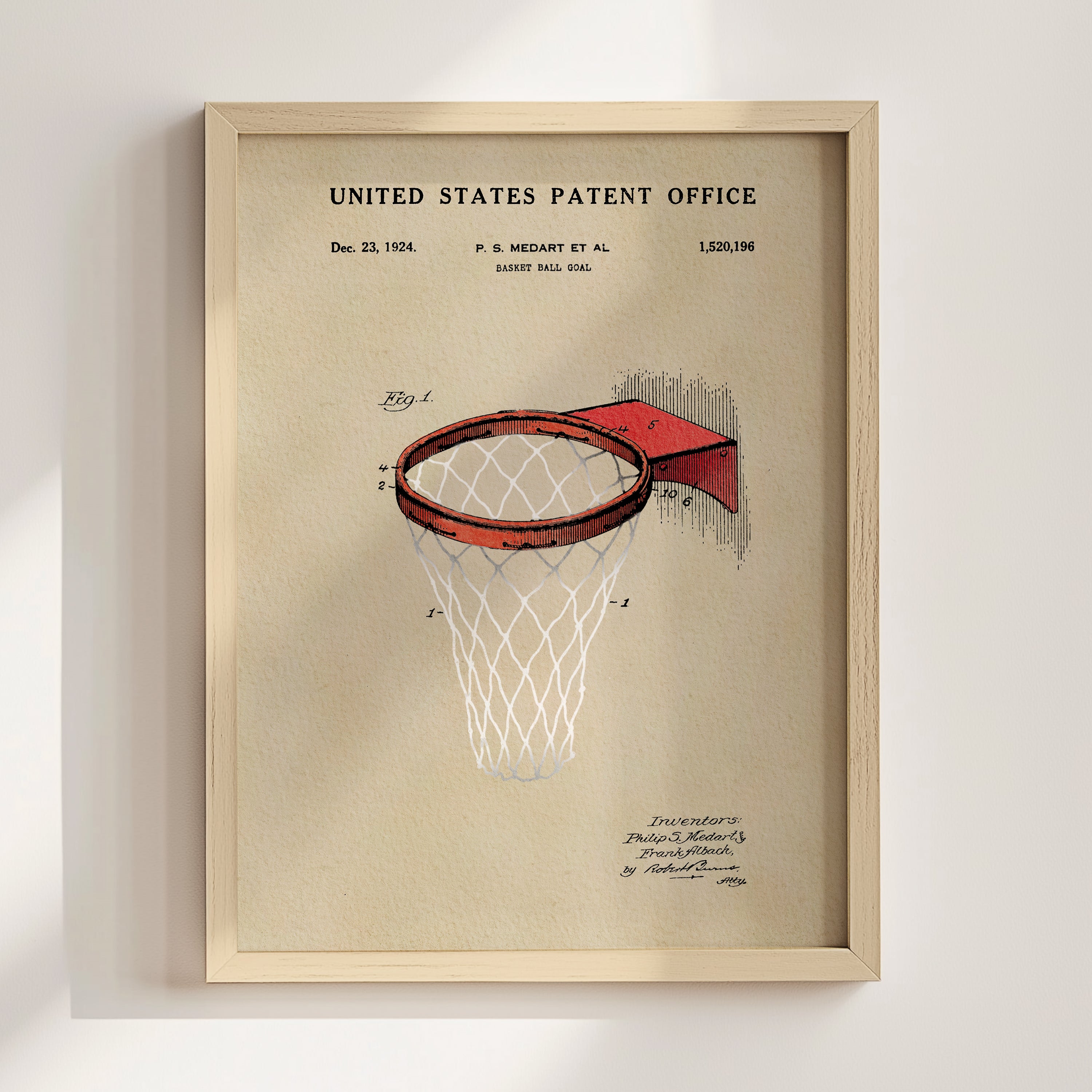 The image is a framed patent drawing of a basketball hoop, depicting the net and the basket.