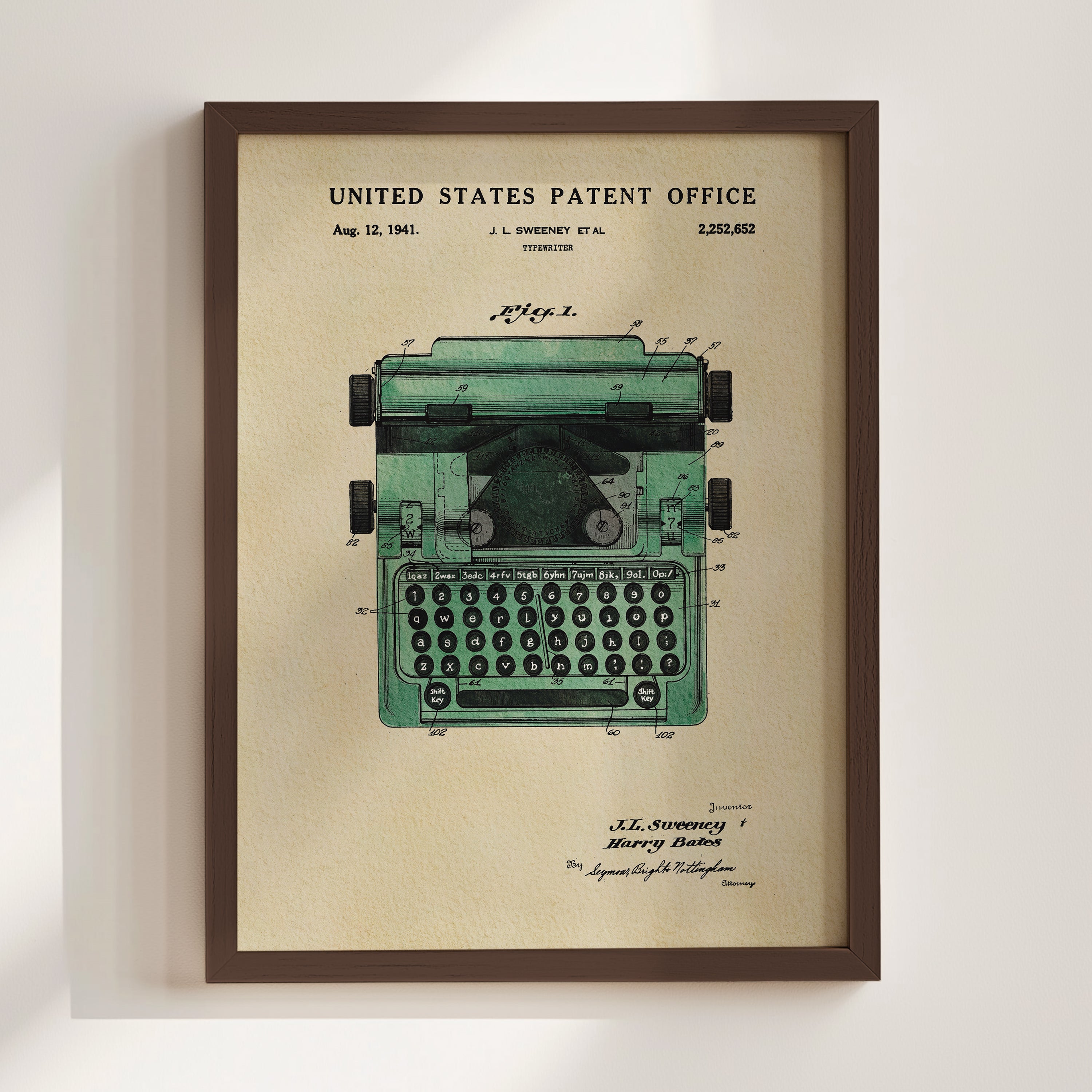 The image is a framed patent drawing of a typewriter, depicting the design and features of the device.