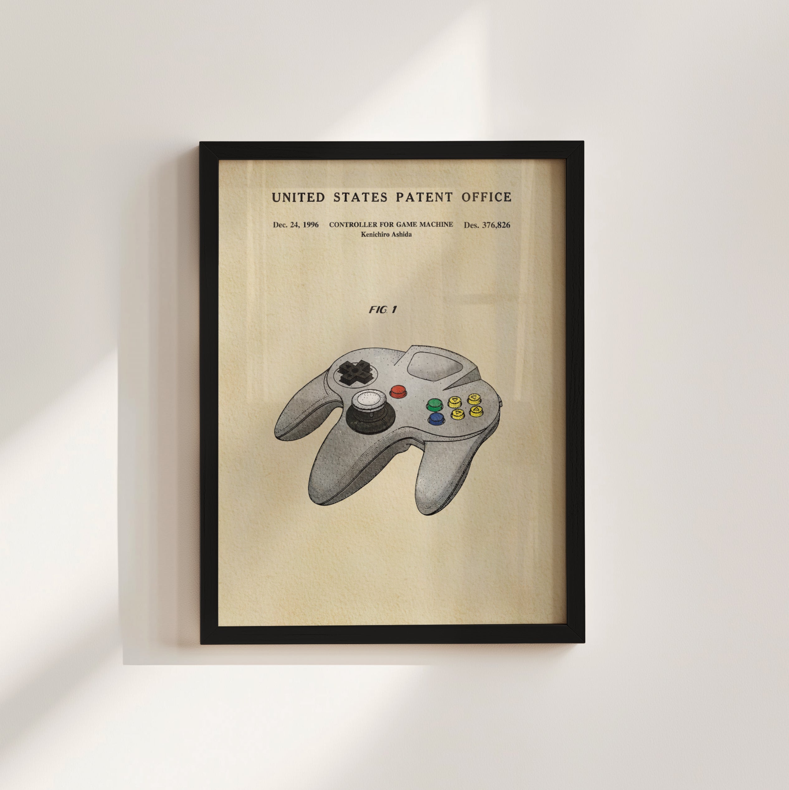 The image is a framed poster or artwork depicting a Nintendo 64 controller, which is a classic video game console.