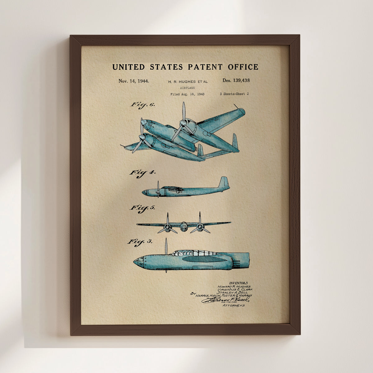 The image is a framed patent drawing of a blue airplane, depicting the design and features of the aircraft.