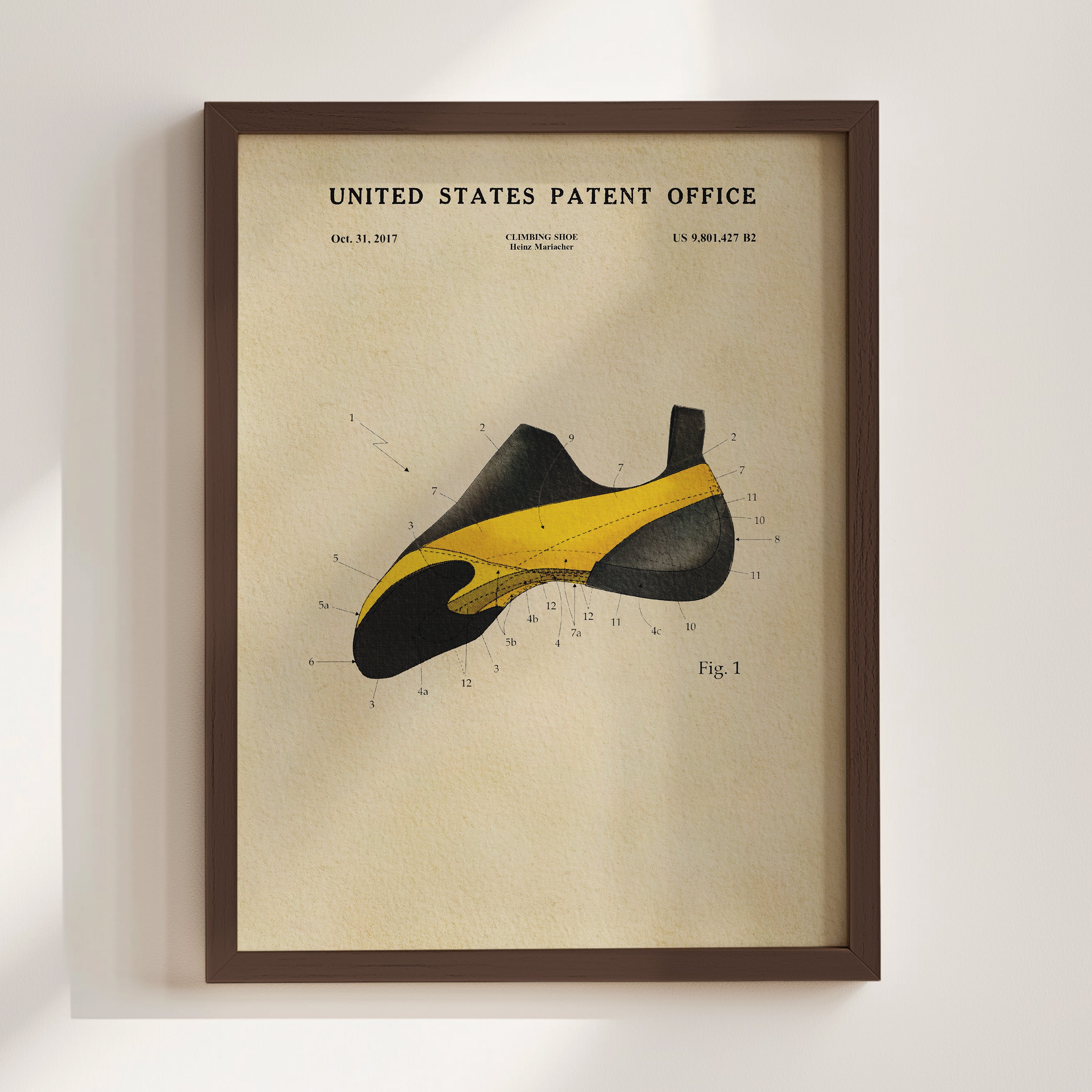 The image is a framed print of a patent filing from the United States Patent Office, depicting a shoe design.