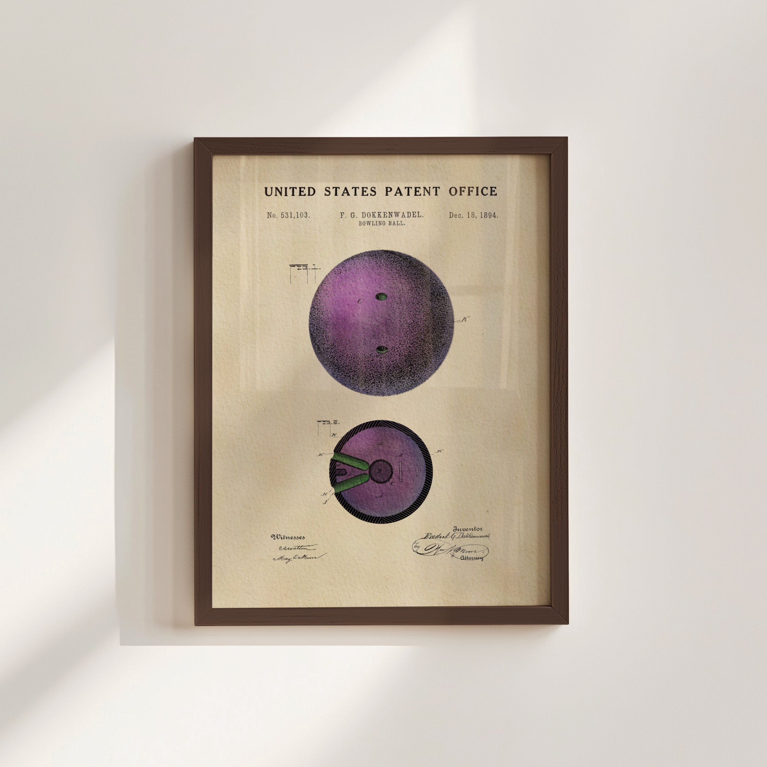The image is a framed patent drawing depicting a bowling ball with a purple color and two holes on it.