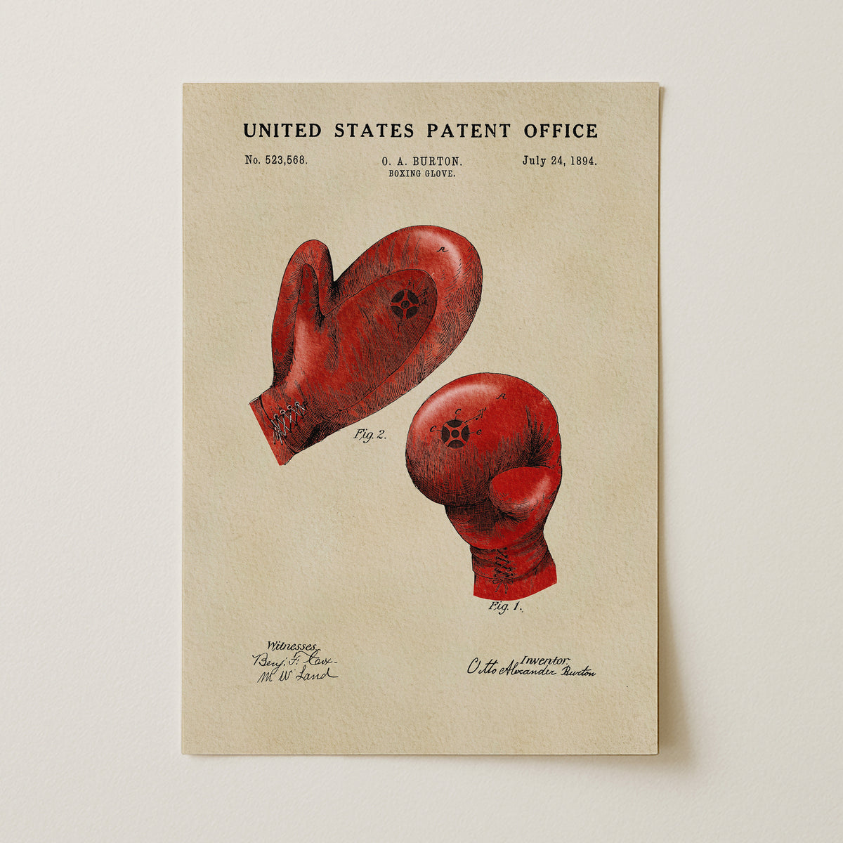 The image is a patent drawing of boxing gloves, depicting two red gloves with a star symbol on them.
