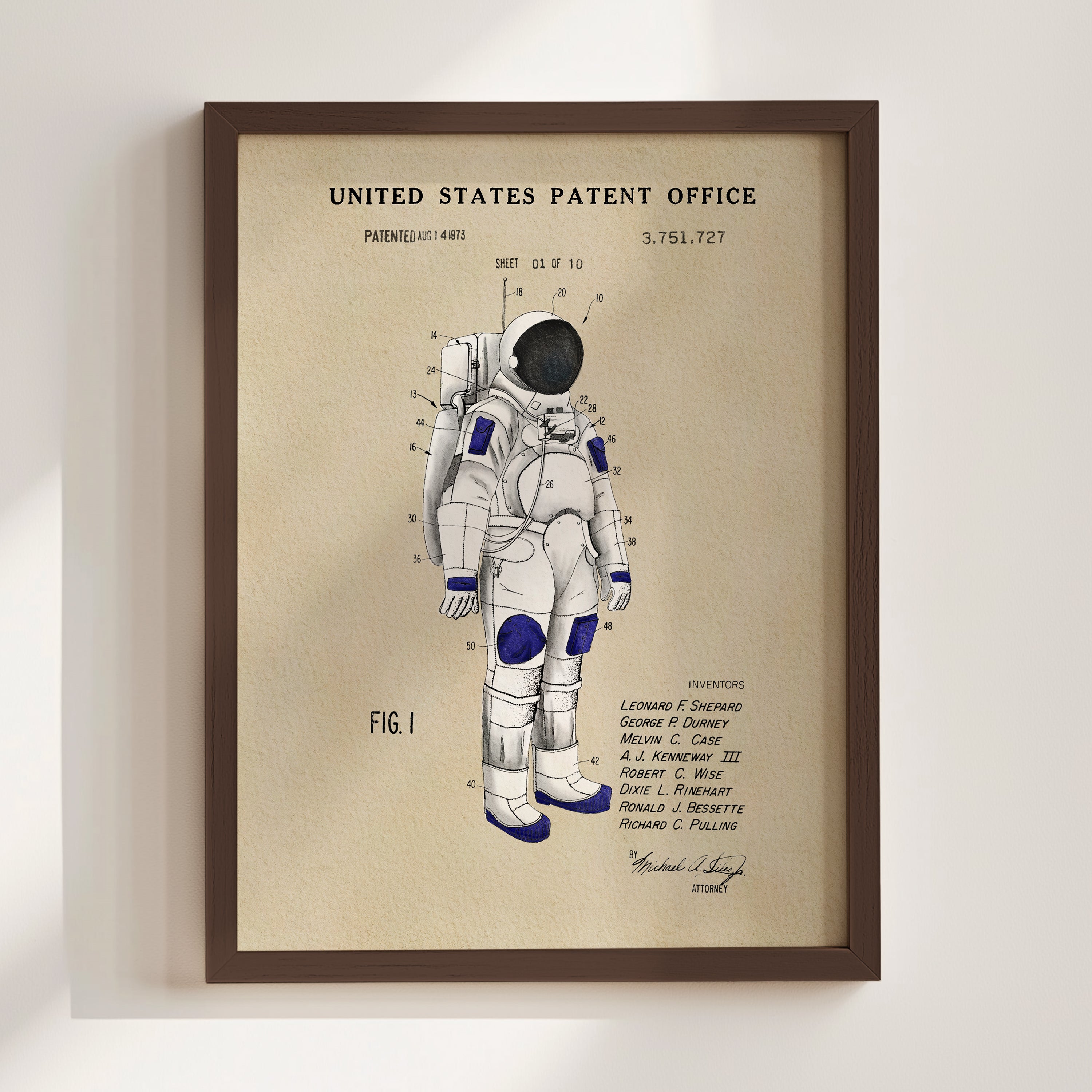 The image is a framed patent drawing of an astronaut's suit, depicting the design and features of the space suit.