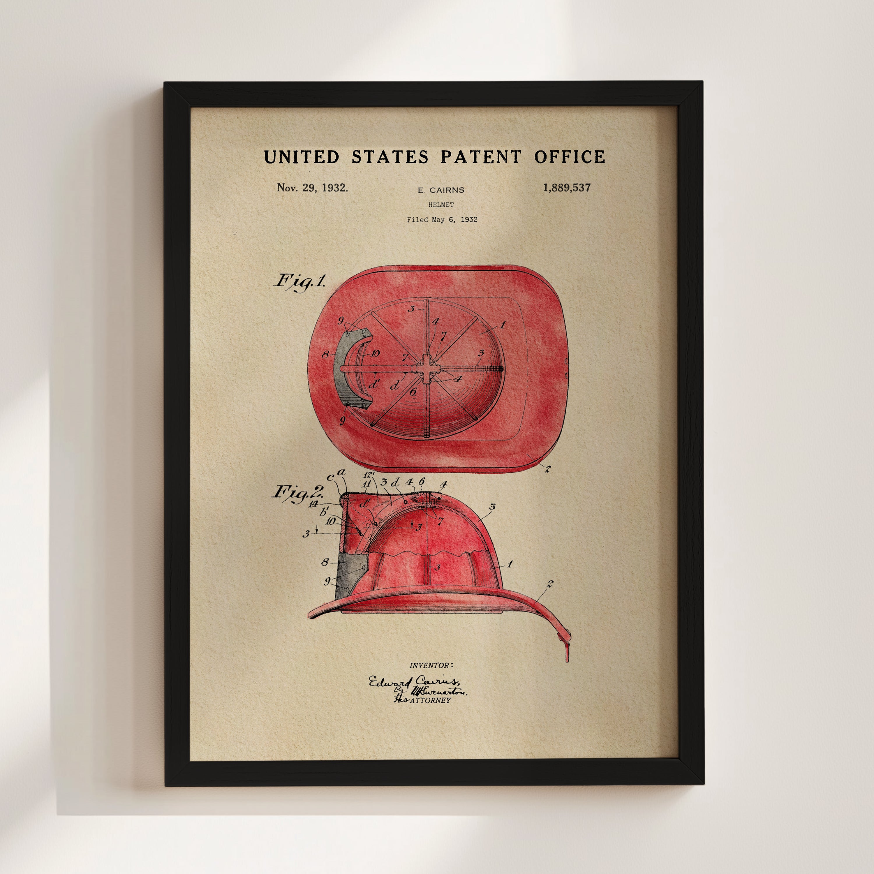 The image is a framed patent drawing of a red fire helmet, depicting the design and features of the helmet.