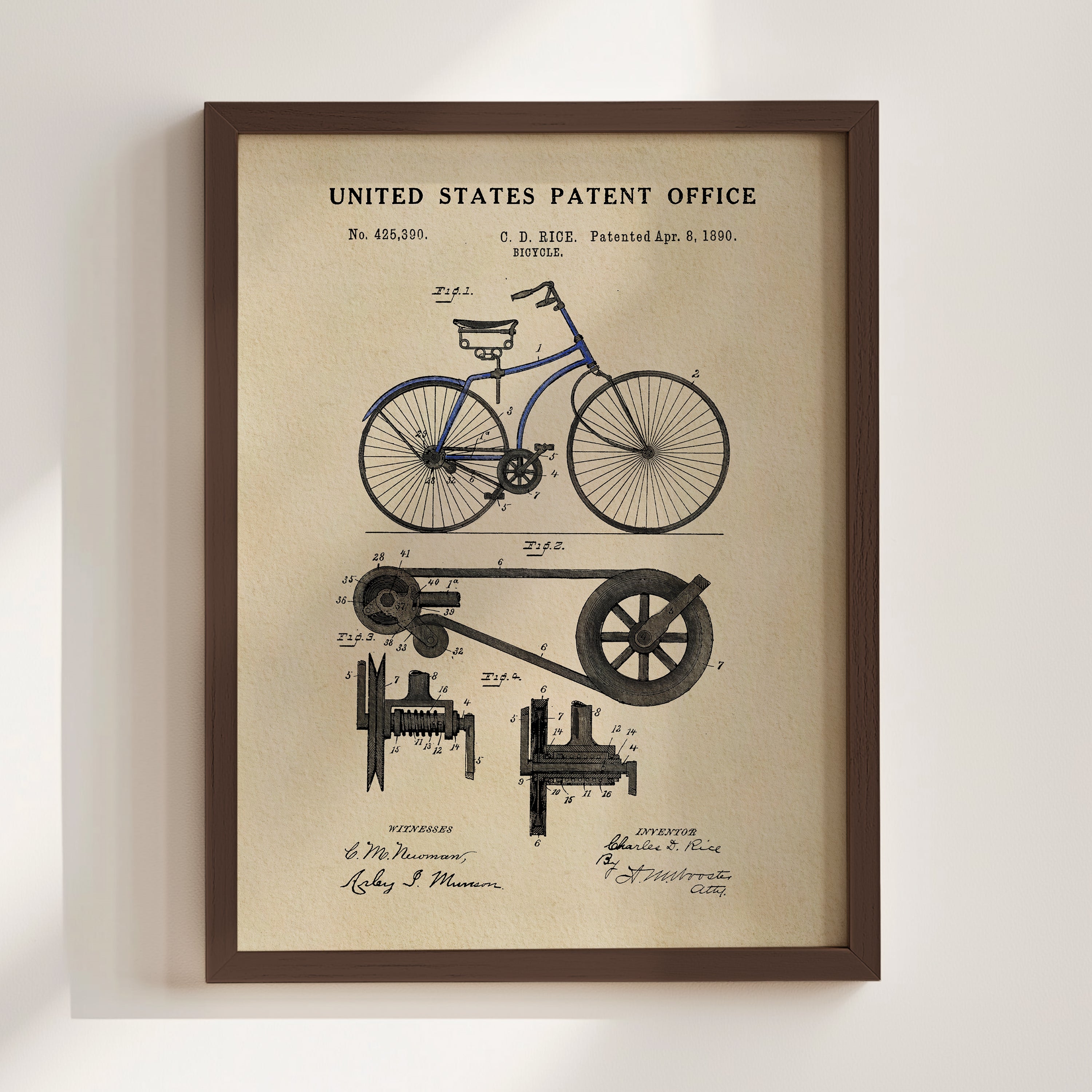 The image is a framed vintage patent drawing of a bicycle, depicting the design and construction of the bicycle.